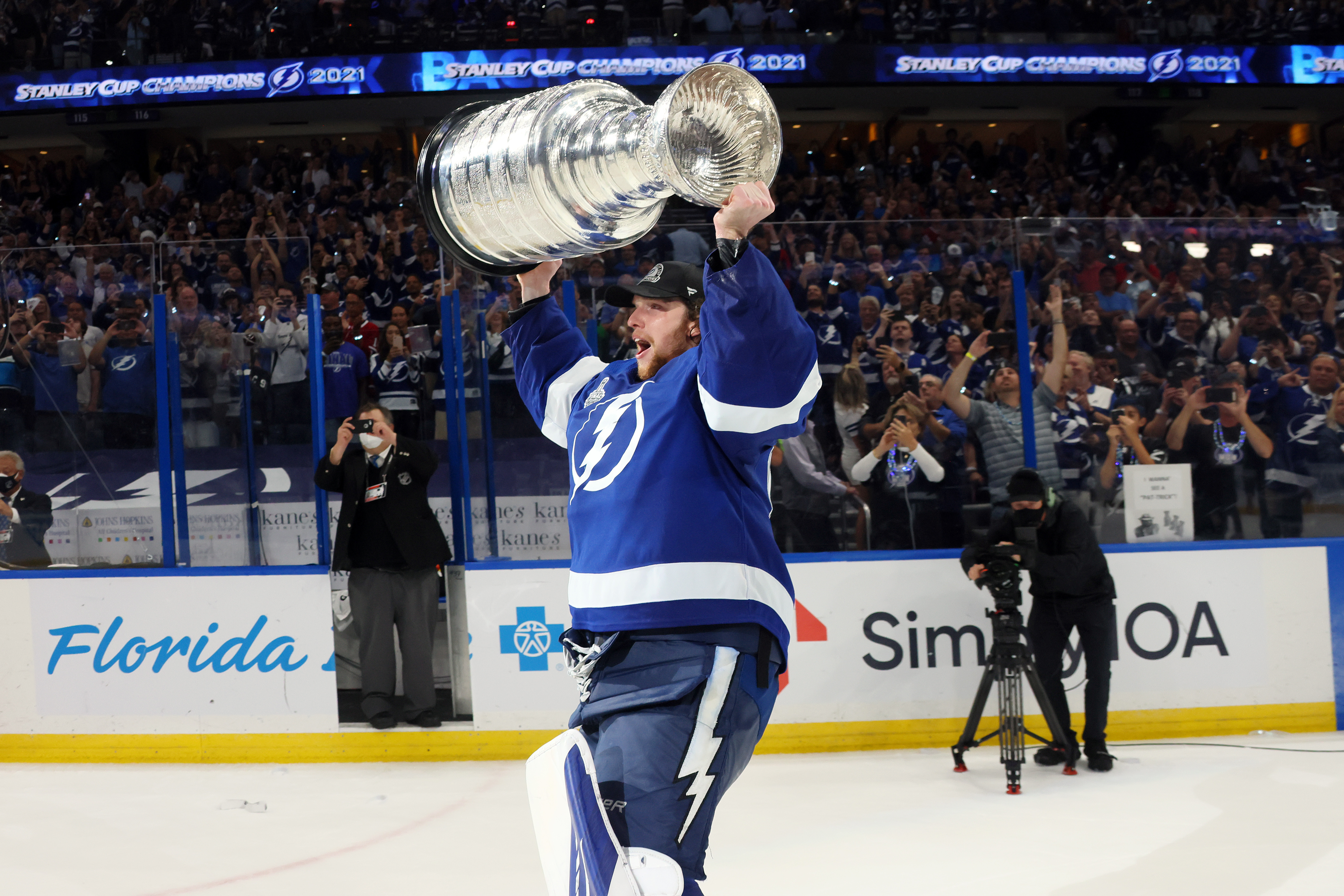 Quick, post pictures of Saint Perry hoisting Stanley Cup to