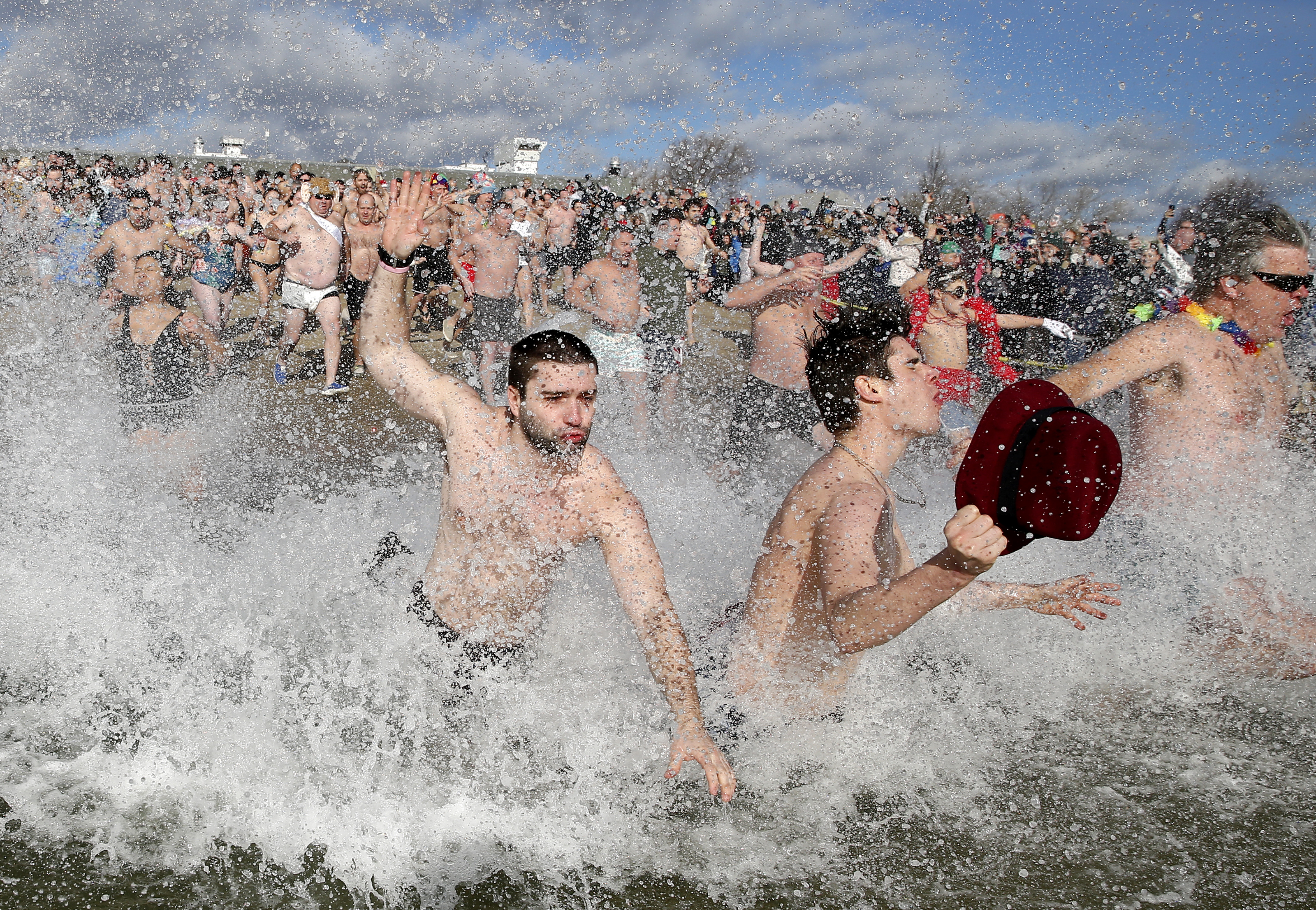 Swimmers took the plunge during the L Street Brownies’ annual New Year’s Day Swim in South Boston.