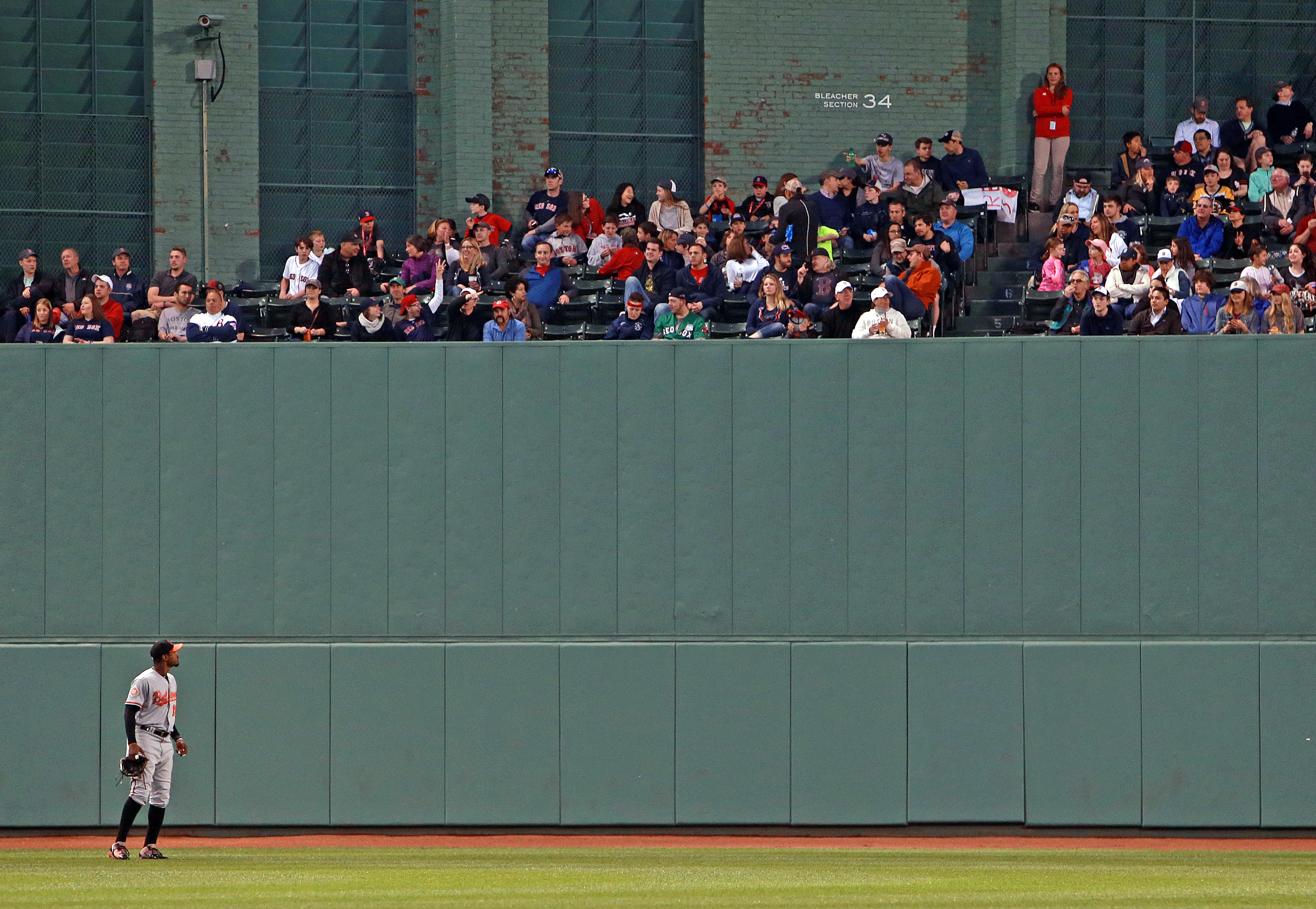 Adam Jones, seen here during a 2017 game with the Orioles in Boston, has spoken several times about the treatment he's received from people when he's played at Fenway.