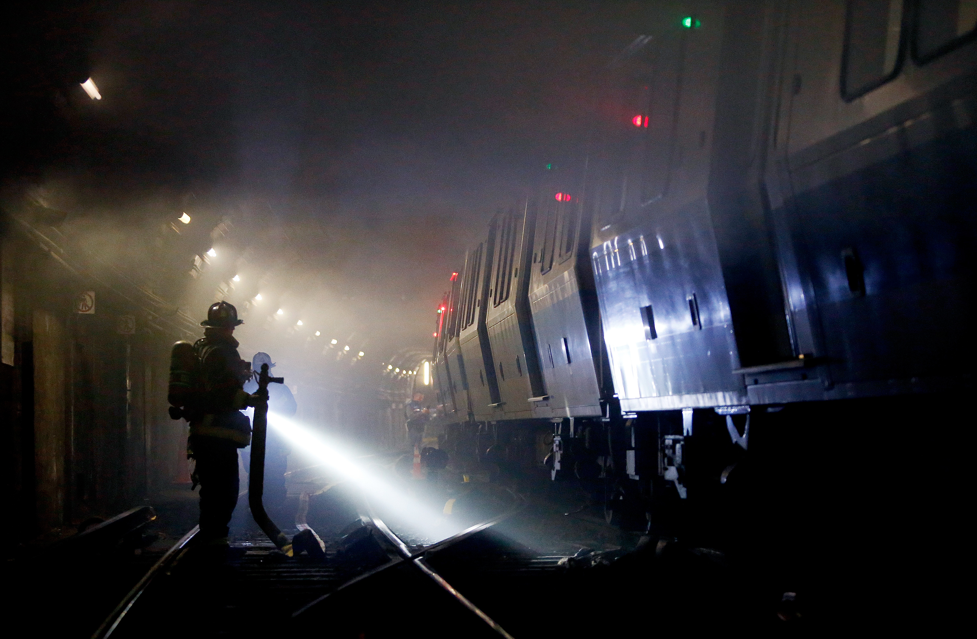 Firefighters entered a tunnel during a MBTA emergency response exercise and evacuation drill involving a blue line train at Bowdoin Station and yard area on January 12.