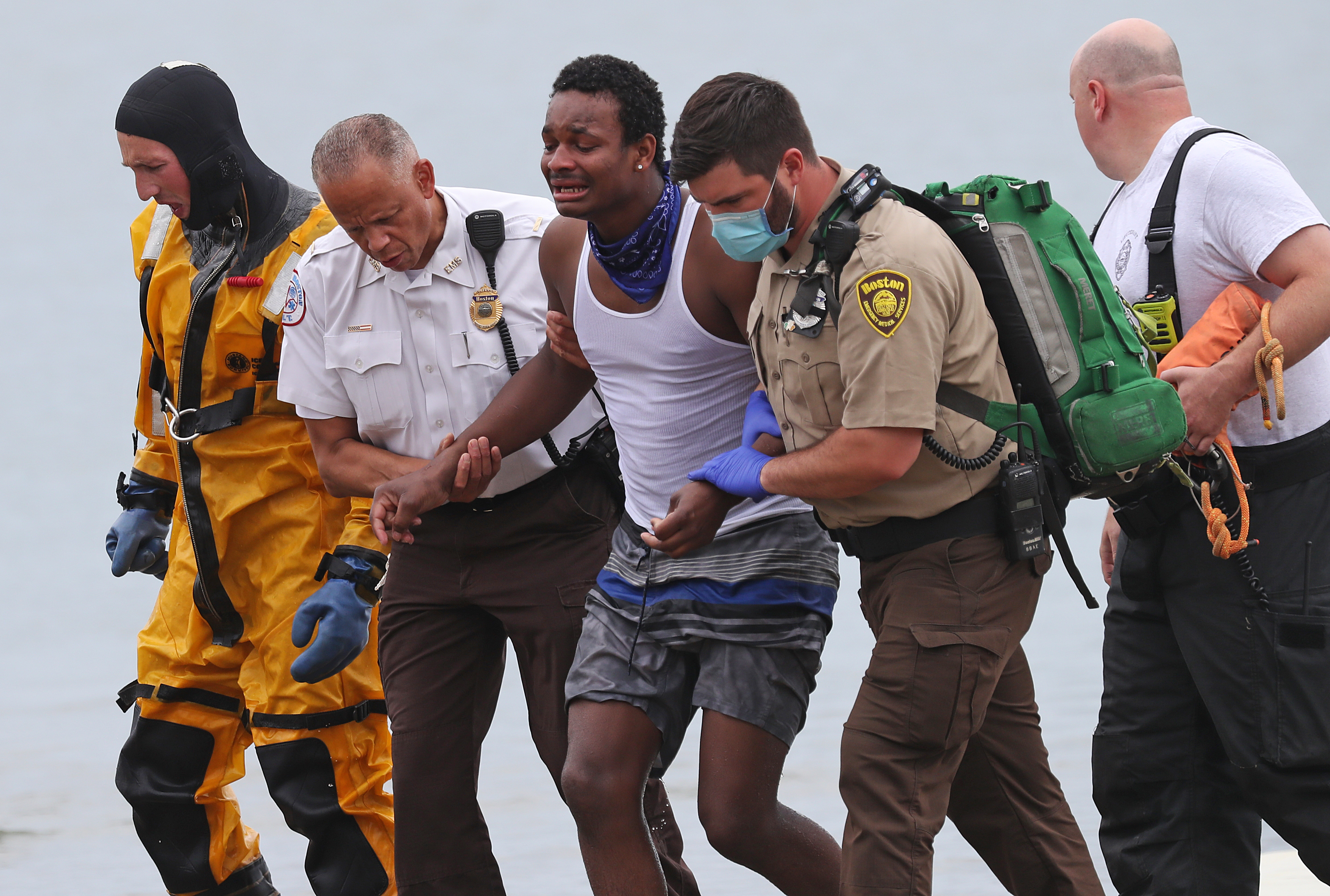 A swimmer who was rescued was brought back to shore at Pleasure Beach while rescue workers looked for his brother.