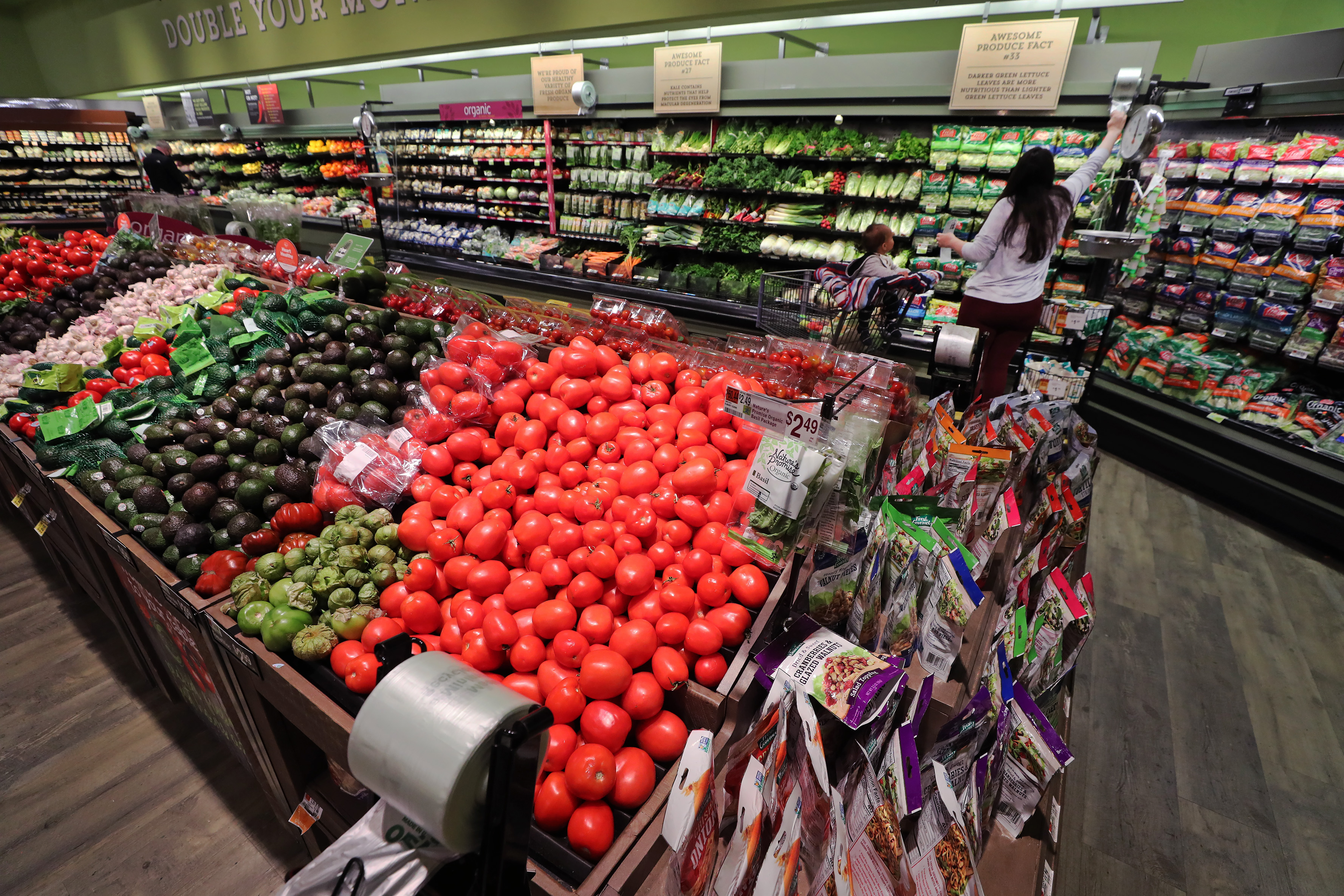 In the produce section of a store in Chelmsford, tomatoes are stacked in "pocket protector" trays to reduce bruising.