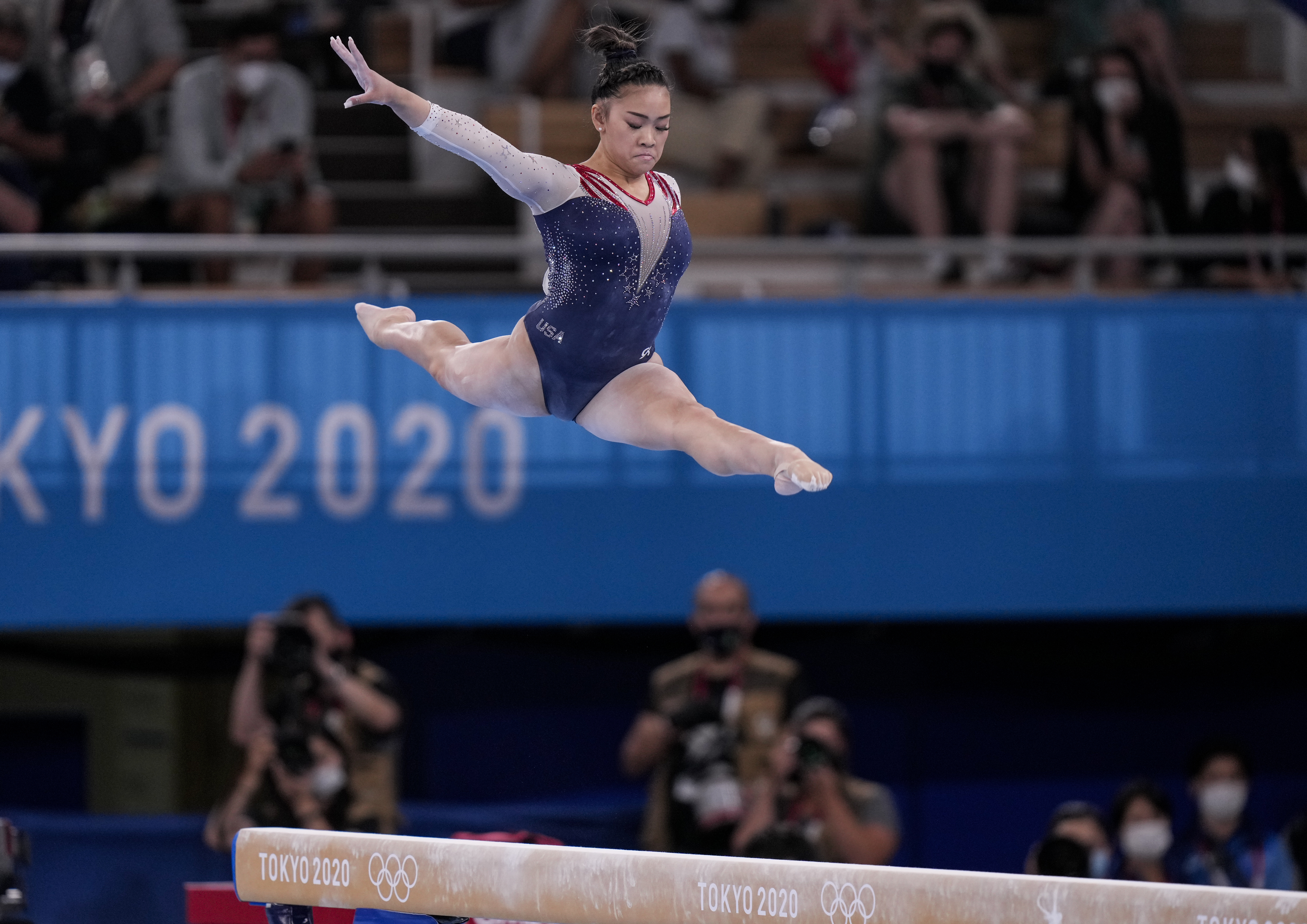 Lee soars above the beam during the all-around.