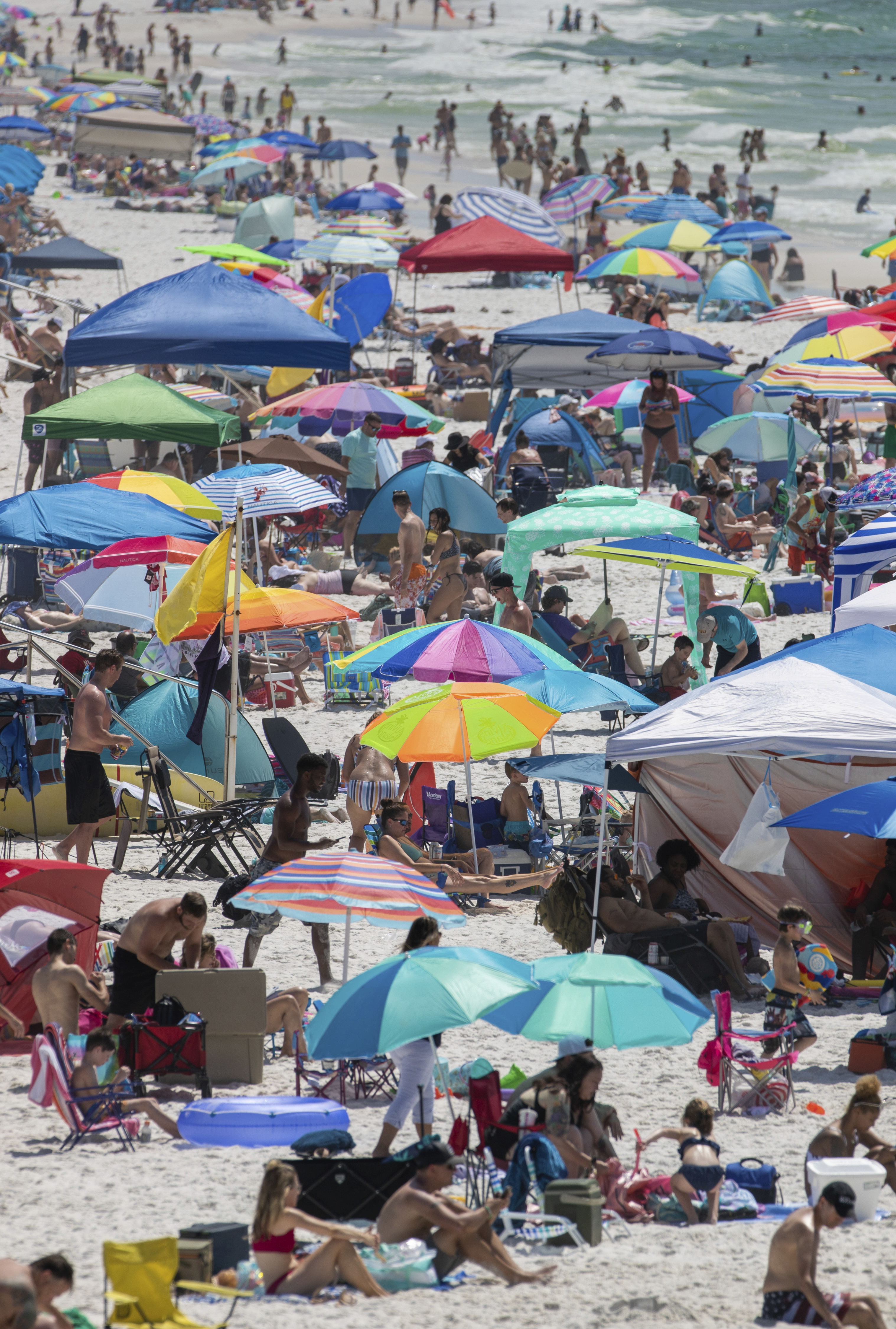 People visited Pensacola Beach in Pensacola, Fla., on Saturday.