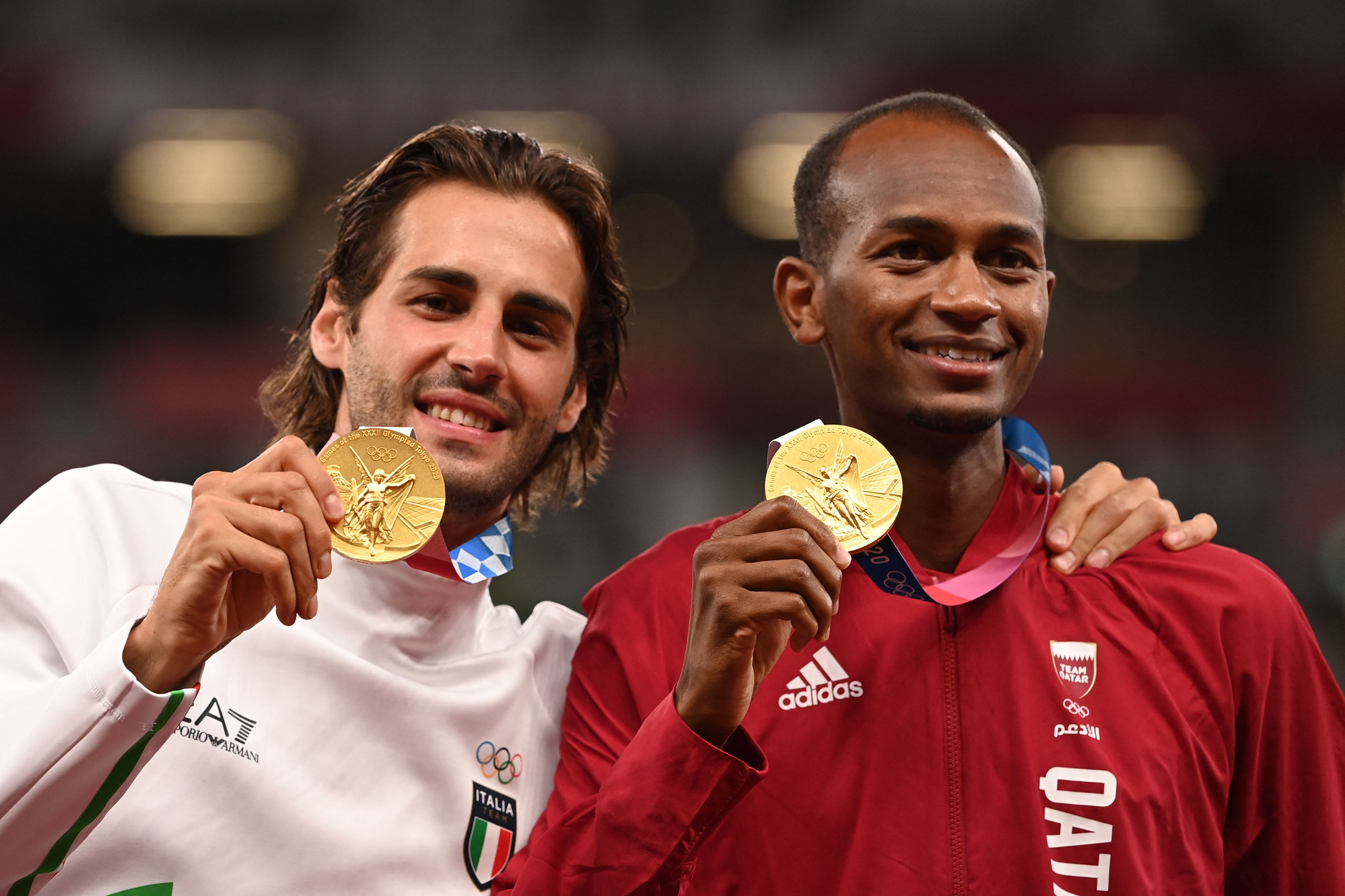 Gianmarco Tamberi (left) and Essa Barshim found a way to split the difference and both come out winners.
