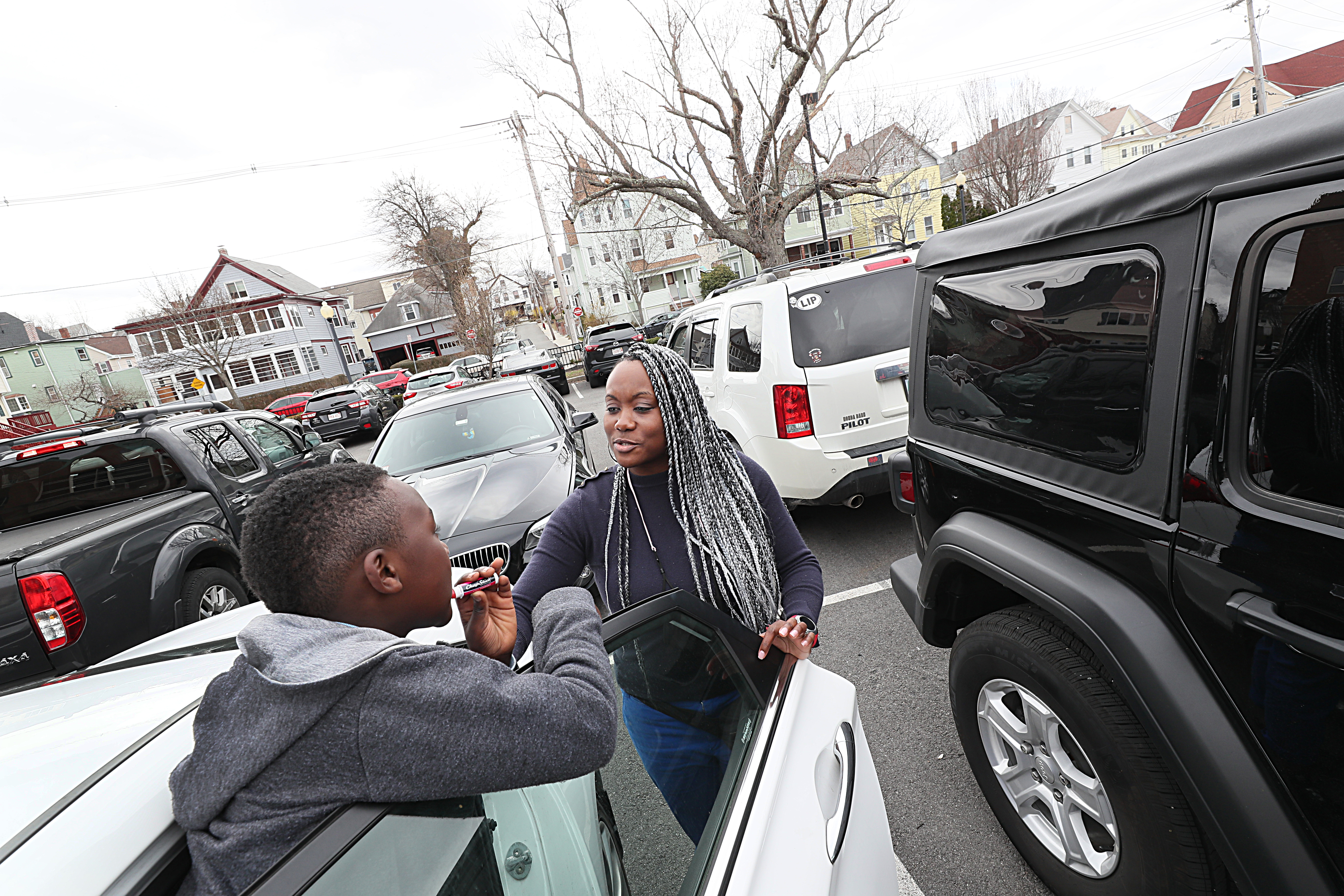 Jennifer Hedrington, a seventh-grade math teacher in Malden, left school Monday after her first full day back inside in her classroom since last March. Her two sons, including Ethan (pictured), attend the school where she teaches.