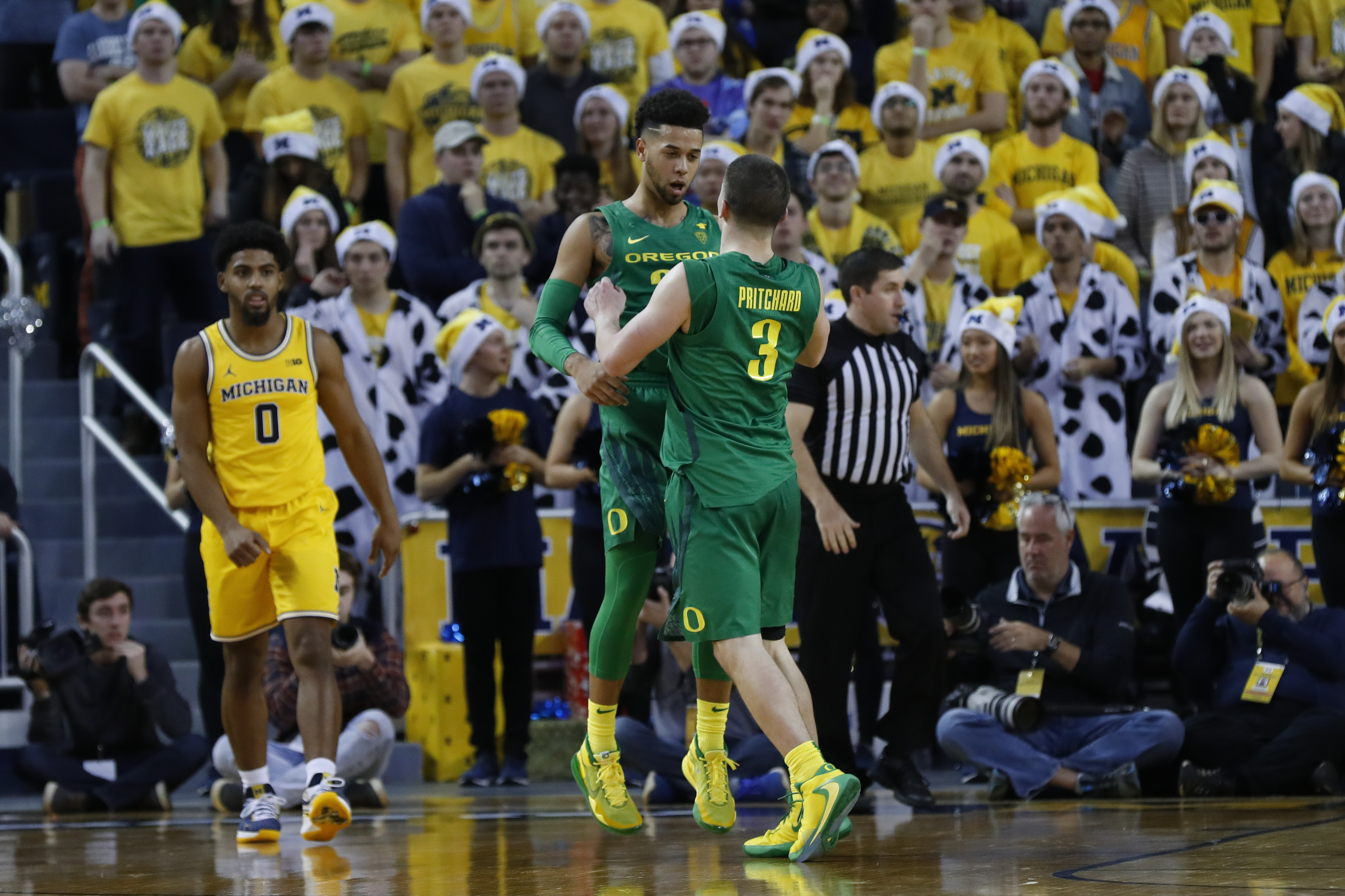 Anthony Mathis and Payton Pritchard grew up together, then played together at Oregon.