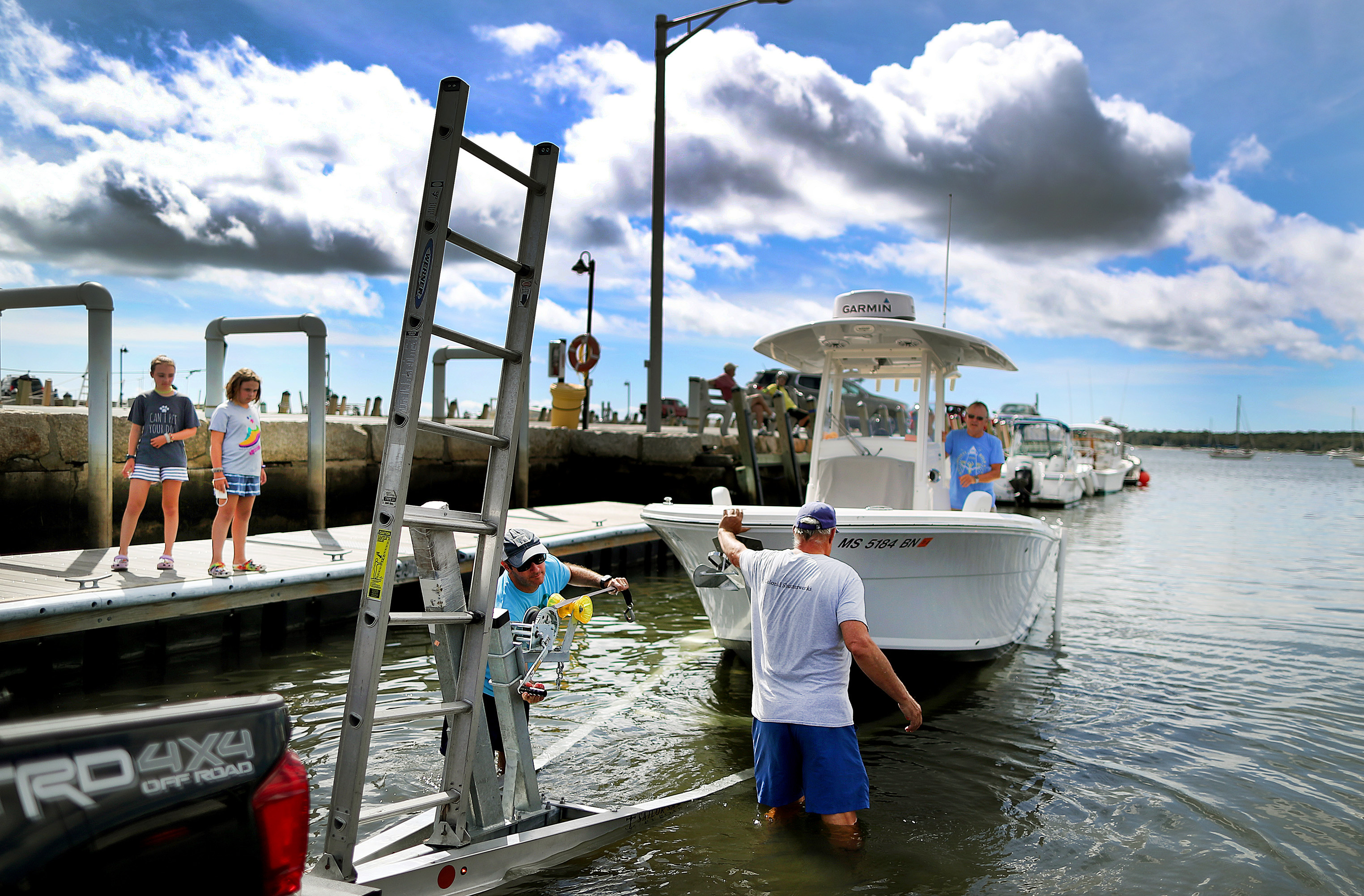 Boaters got an early start getting their boats out of the water in Mattapoisett Harbor.