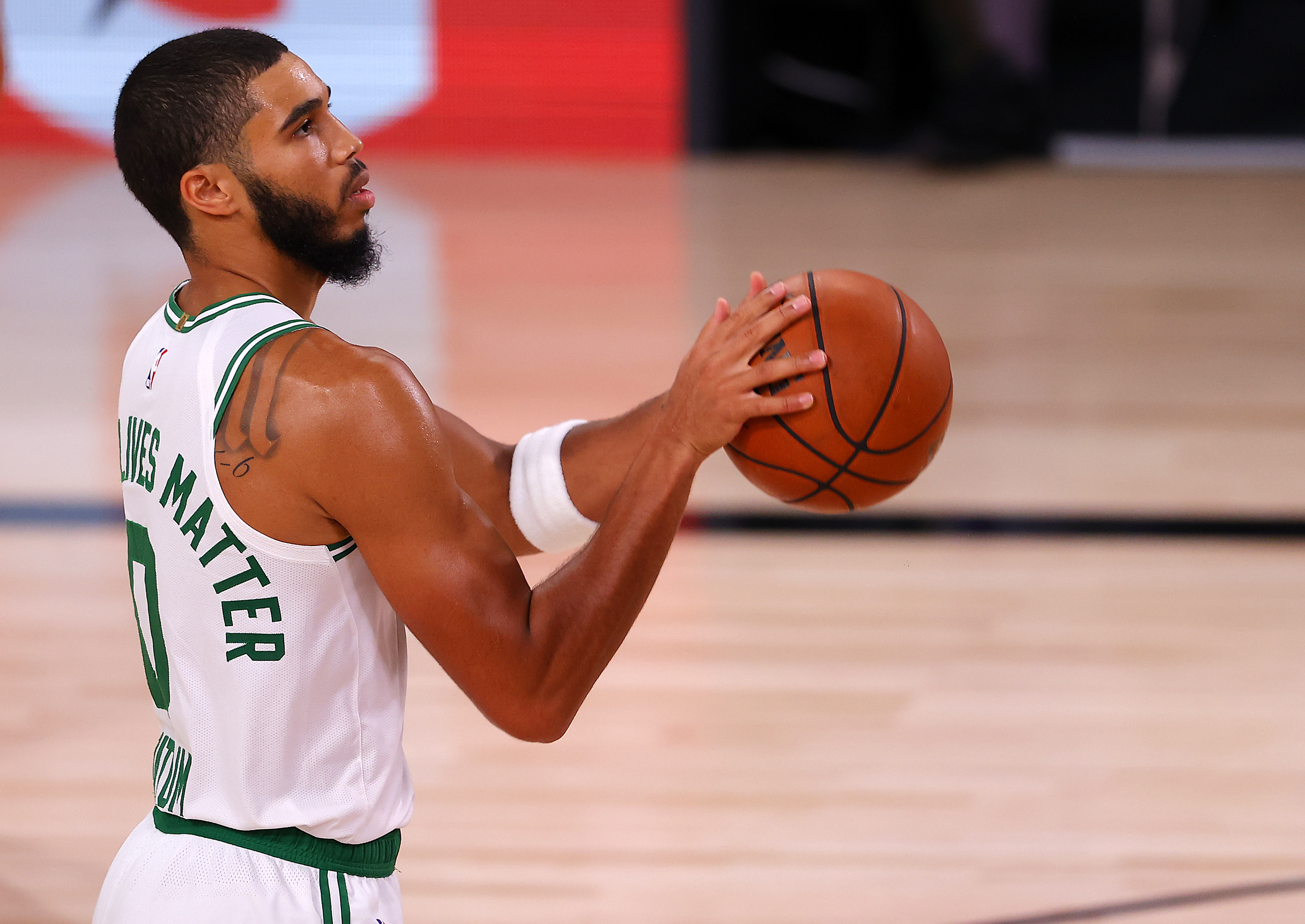 Jayson Tatum handles the ball during the third quarter of Tuesday's game.