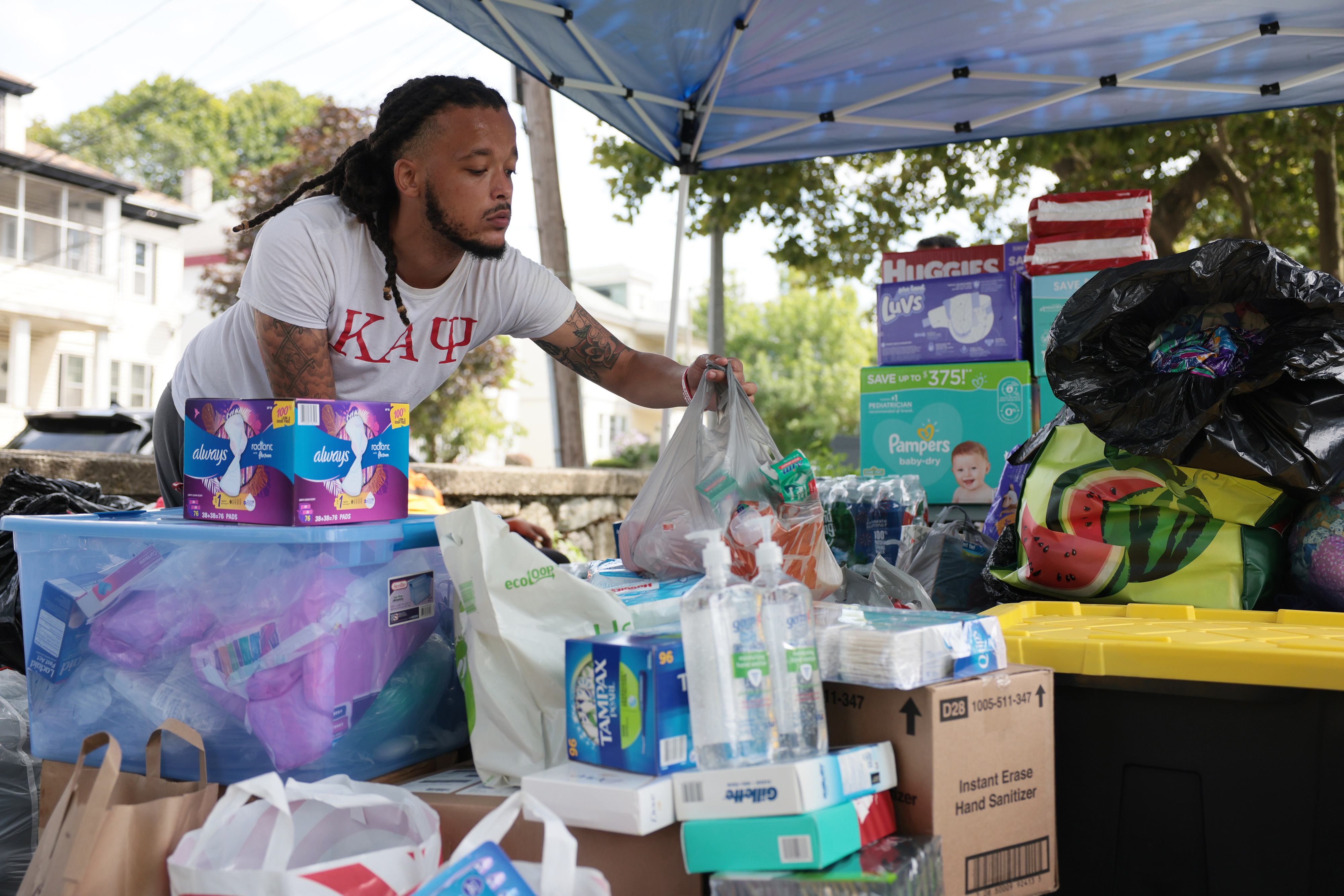 Ernst Jean-Jacques, of Haverhill, helped to sort through the supplies donated to a supply drive for Haiti hosted by The Freedom Fighters Coalition and Violence in Boston. 