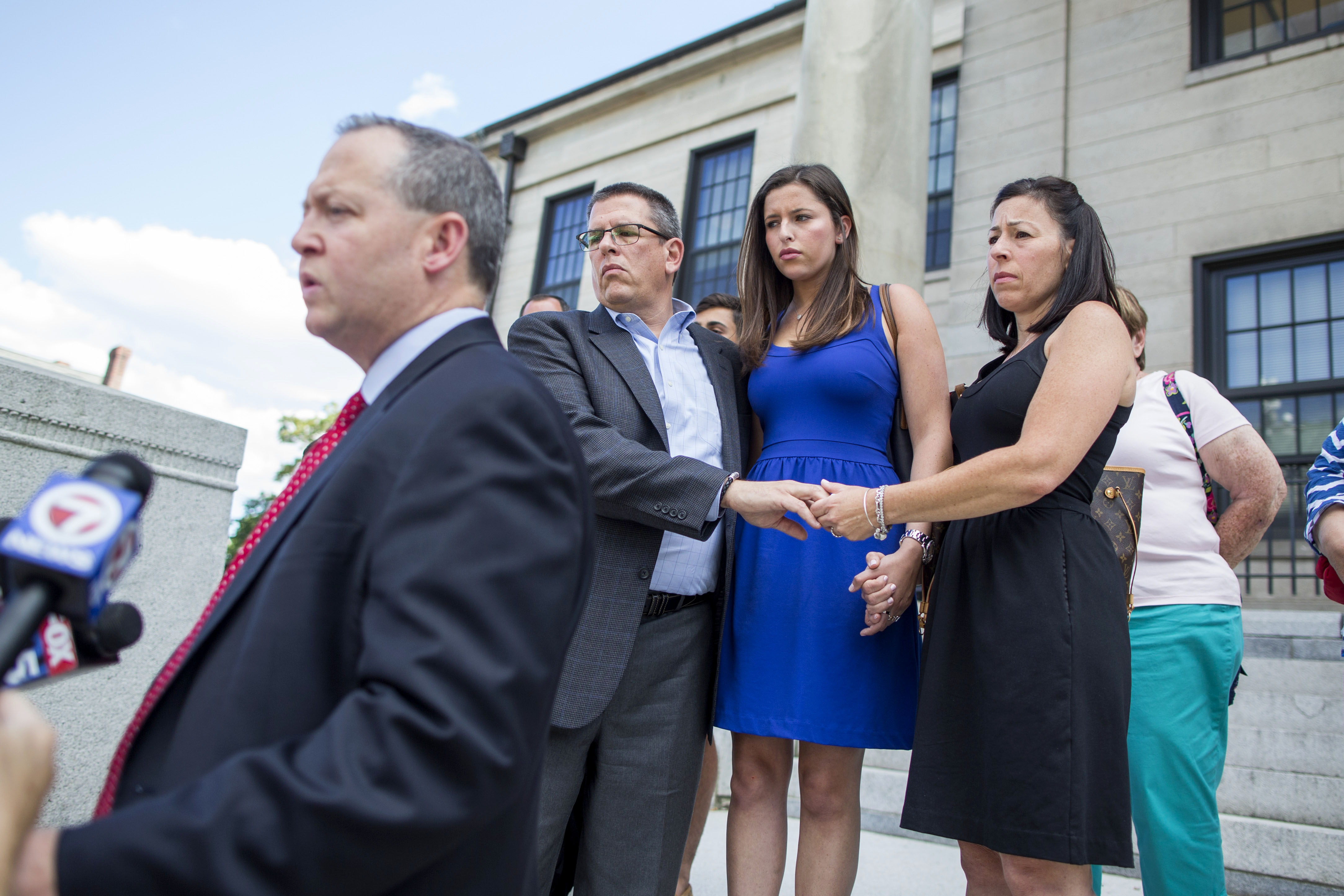 Marc Cremer, Morgan Cremer, and Ivie Cremer listened to family friend Brian Kelly give a statement after the sentencing of Jeffrey Bickoff at Norfolk Superior Court on July 31, 2015. Bickoff was convicted of motor vehicle homicide for a crash that killed Haley Cremer, 20, in 2014.