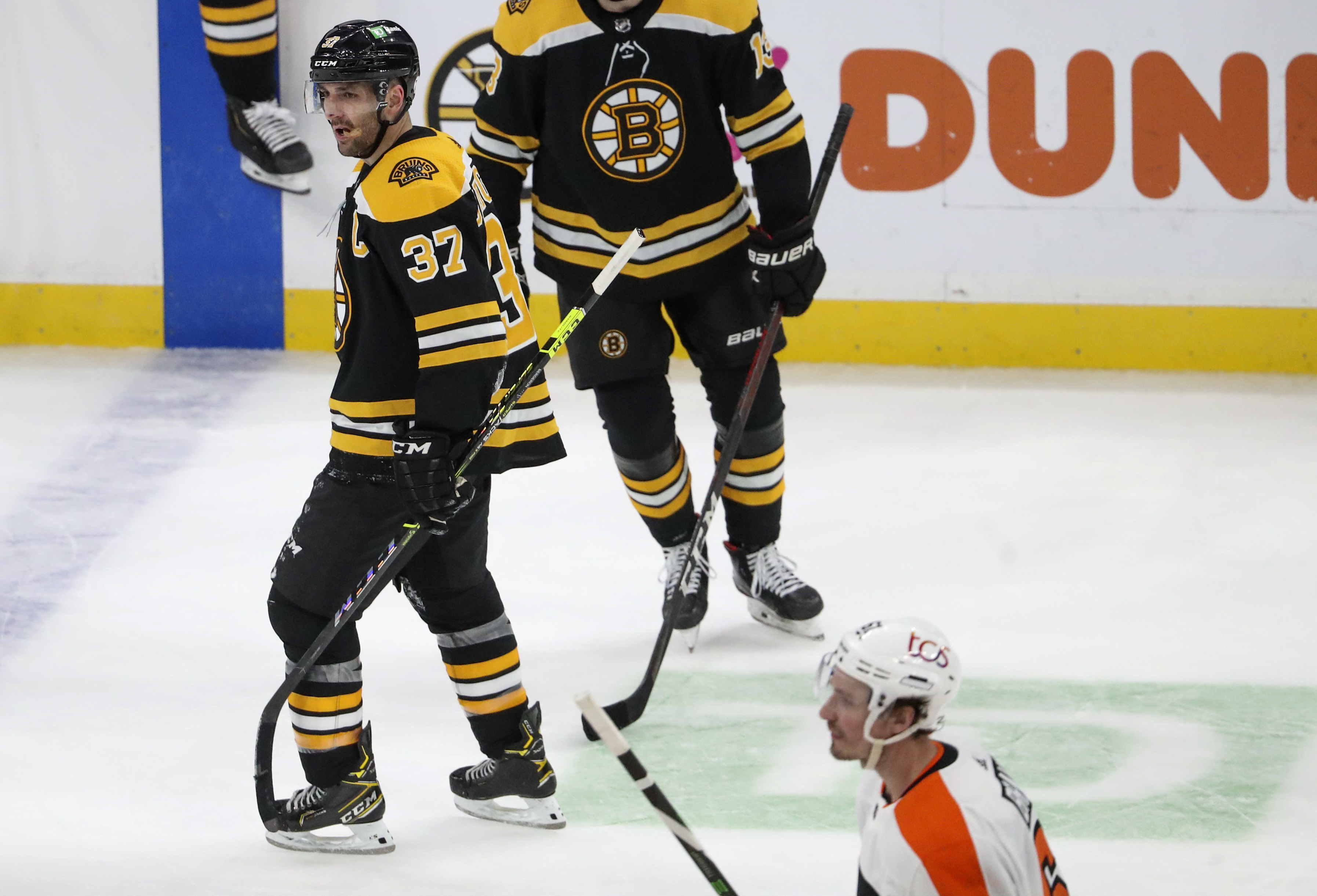 Patrice Bergeron scored an overtime goal Monday night, but his stumble also allowed the Flyers' Travis Sanheim to score the winning goal in overtime.