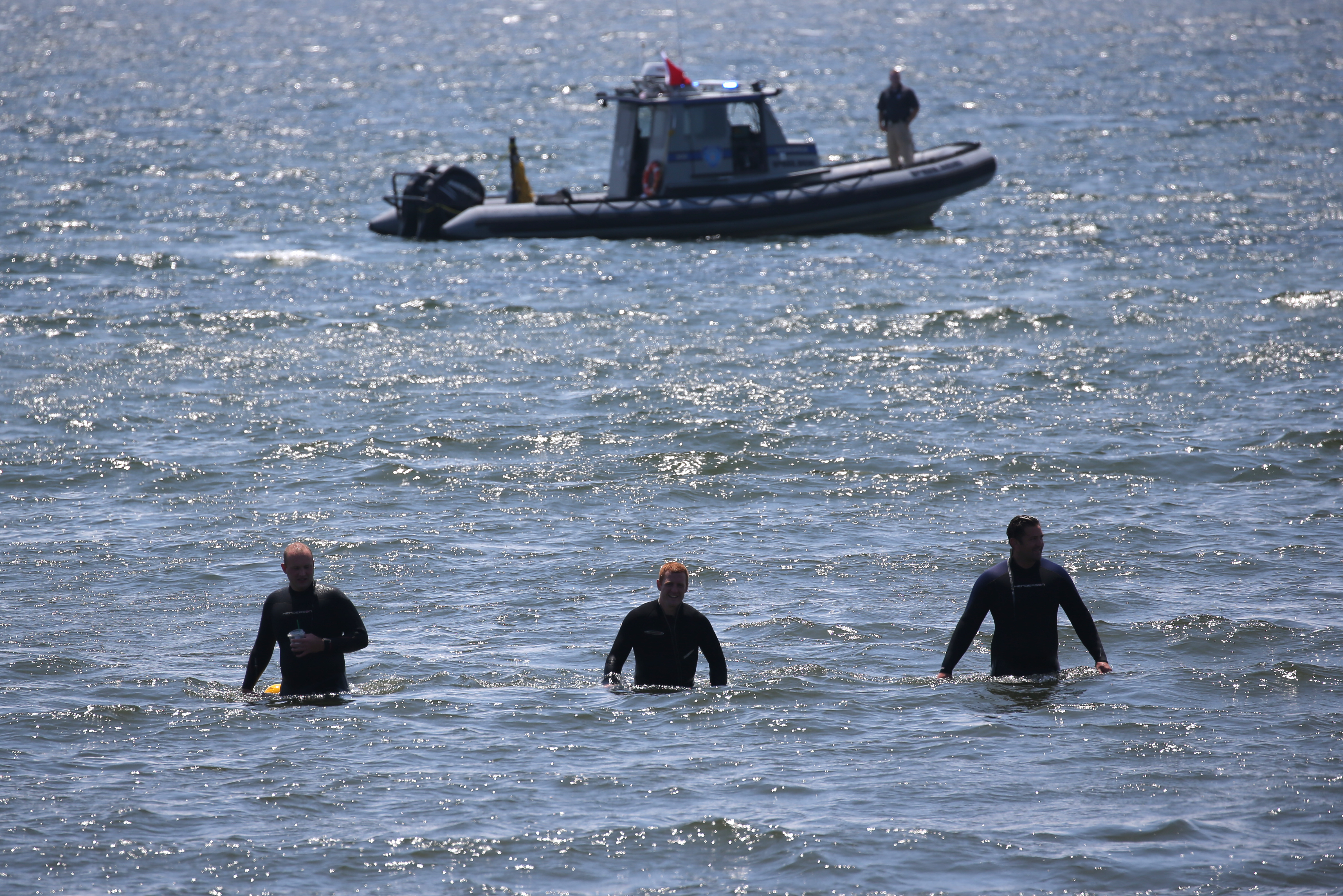 Divers conducted a search in waters off Conimicut Point Park on Monday. The body of a 10-year-old girl was found in an area that is known for strong rip currents.