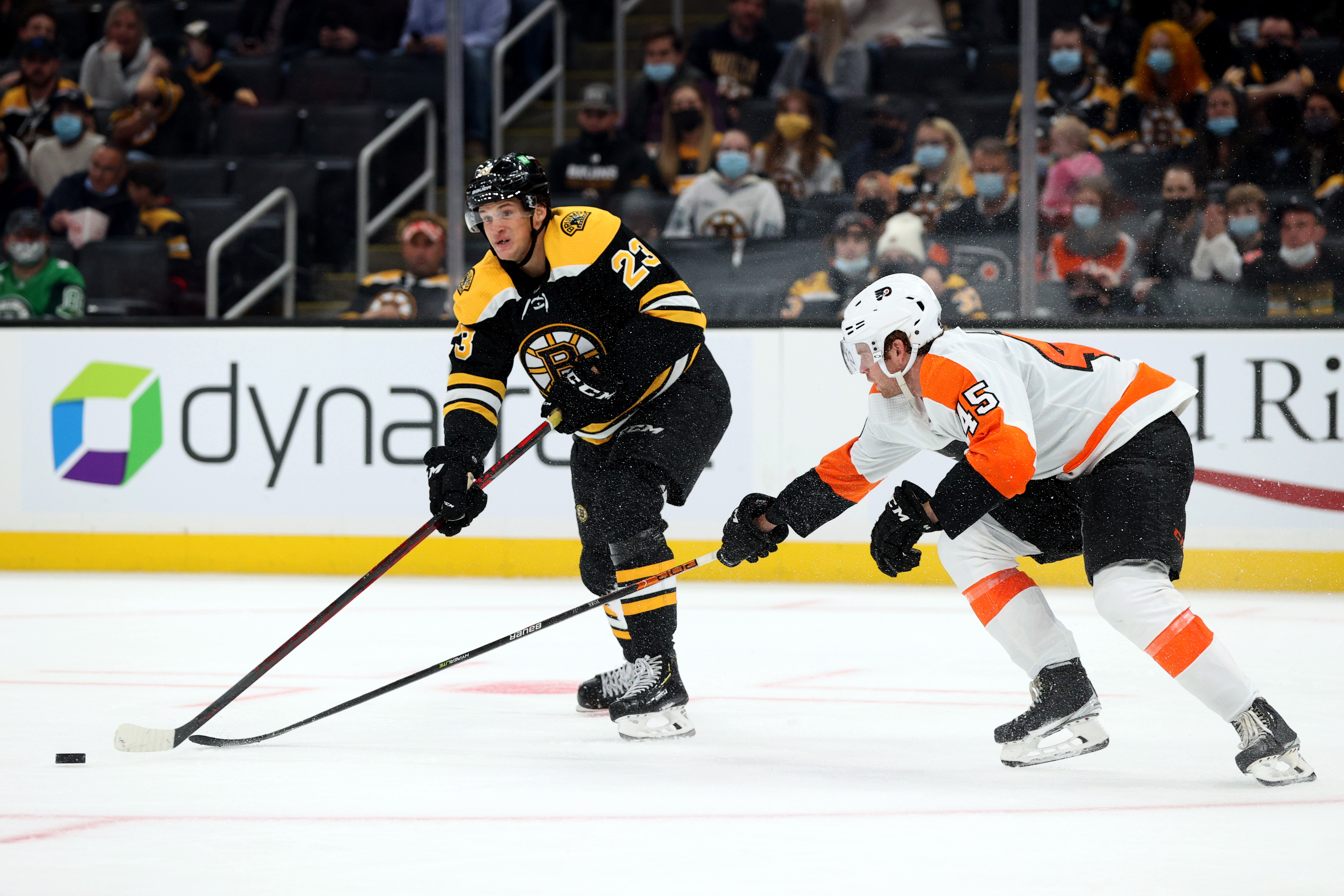 Jack Studnicka skates against Philadelphia's Cam York in the third period of Thursday's preseason contest.