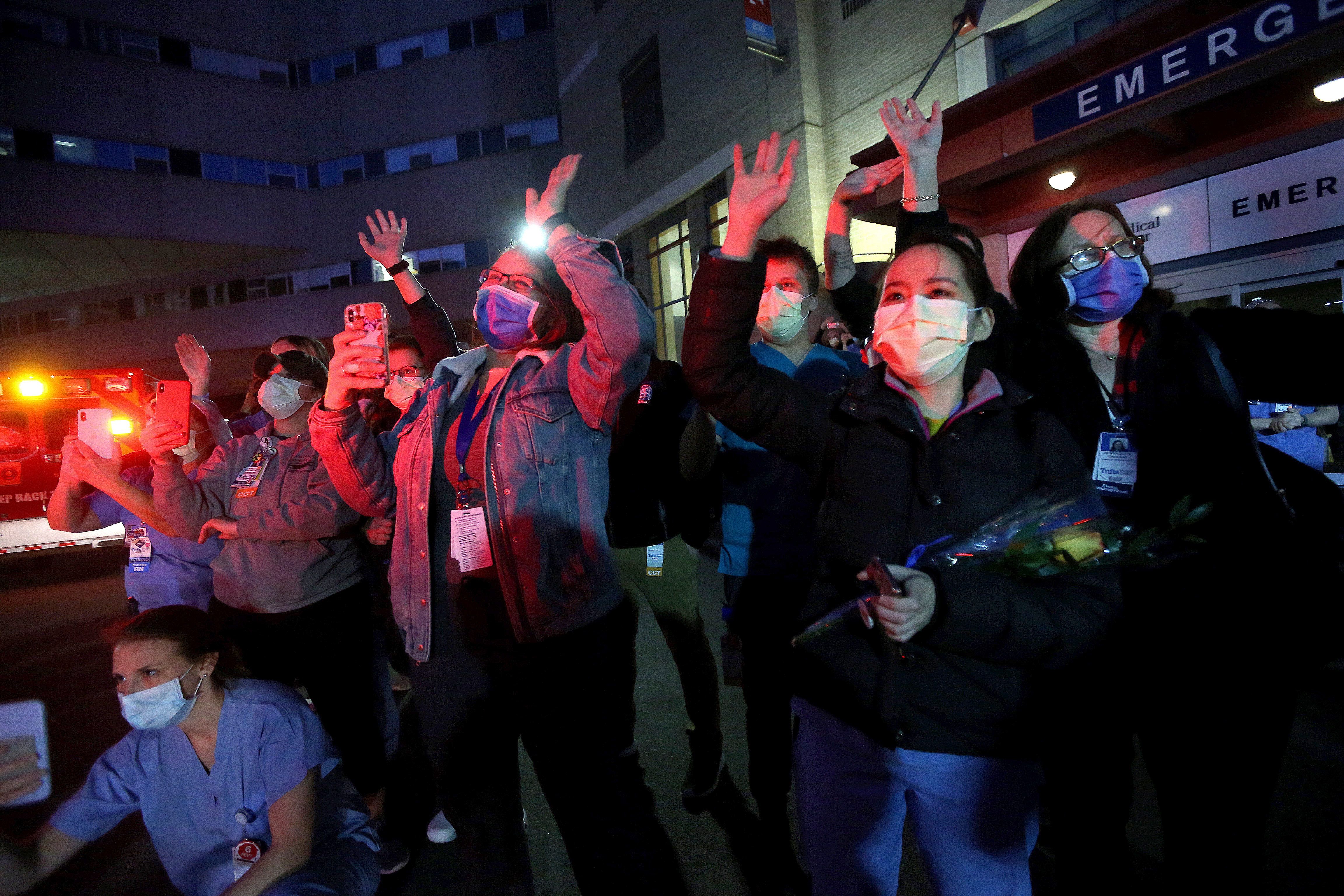 Boston, MA - 4/15/2020   -  First responders for the City of Boston pay tribute to the hard work and dedication of Tufts Medical Center staff members during the COVID-19 Pandemic with a rolling rally past the hospital.  (Barry Chin/Globe Staff)