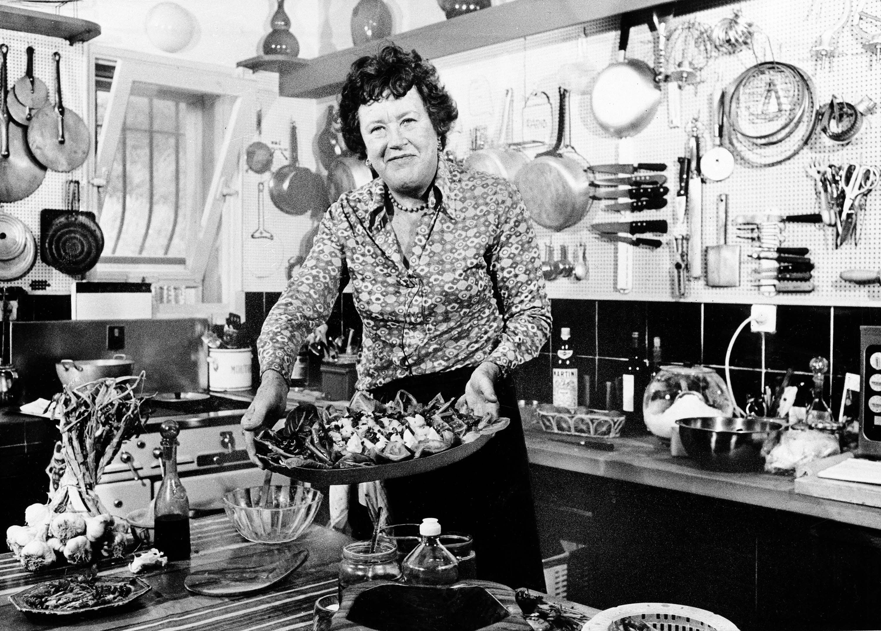 Julia Child with a salade niçoise she prepared in her kitchen in the south of France in 1978.