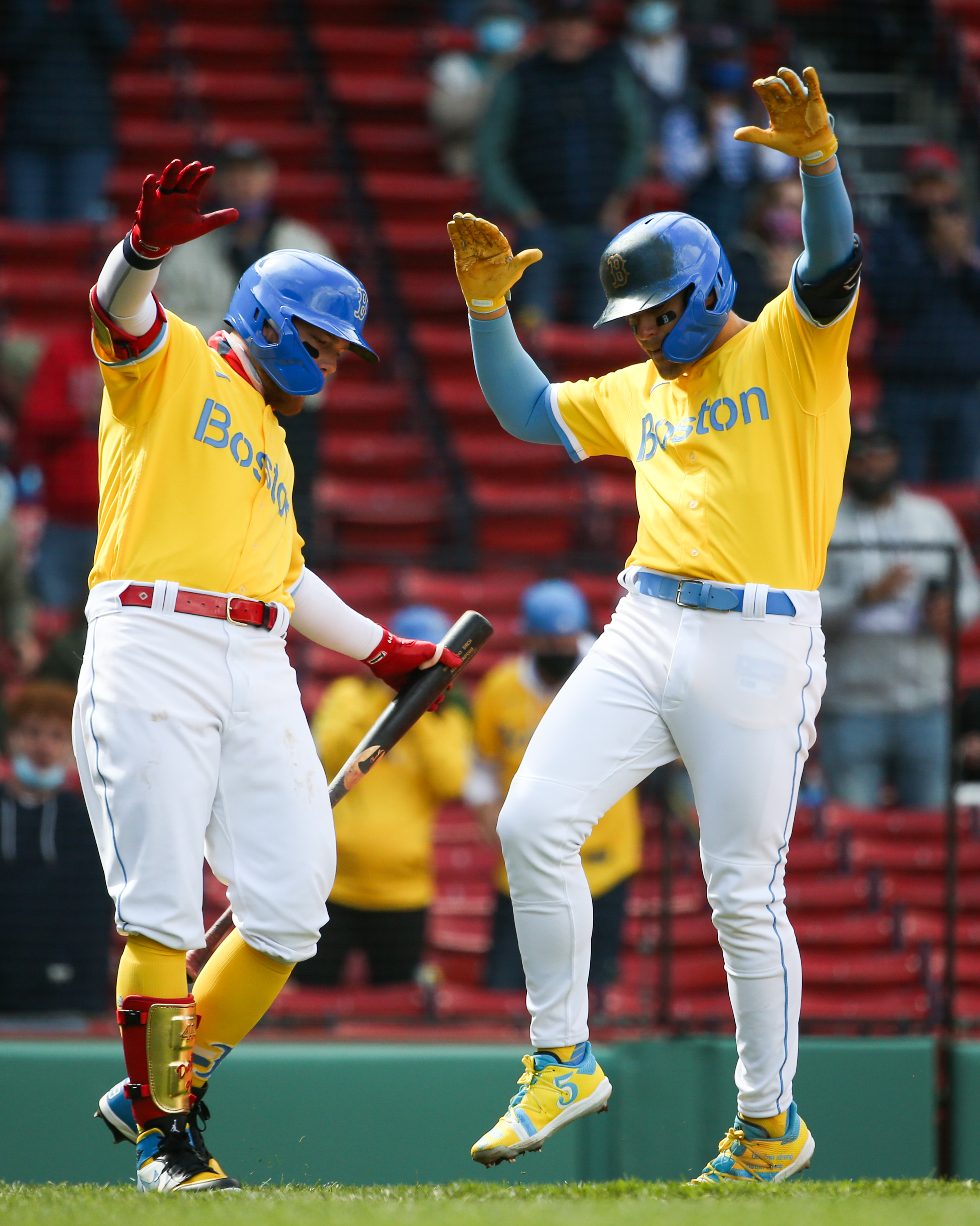 Kiké Hernández (right) celebrates his solo home run with Red Sox teammate Alex Verdugo.
