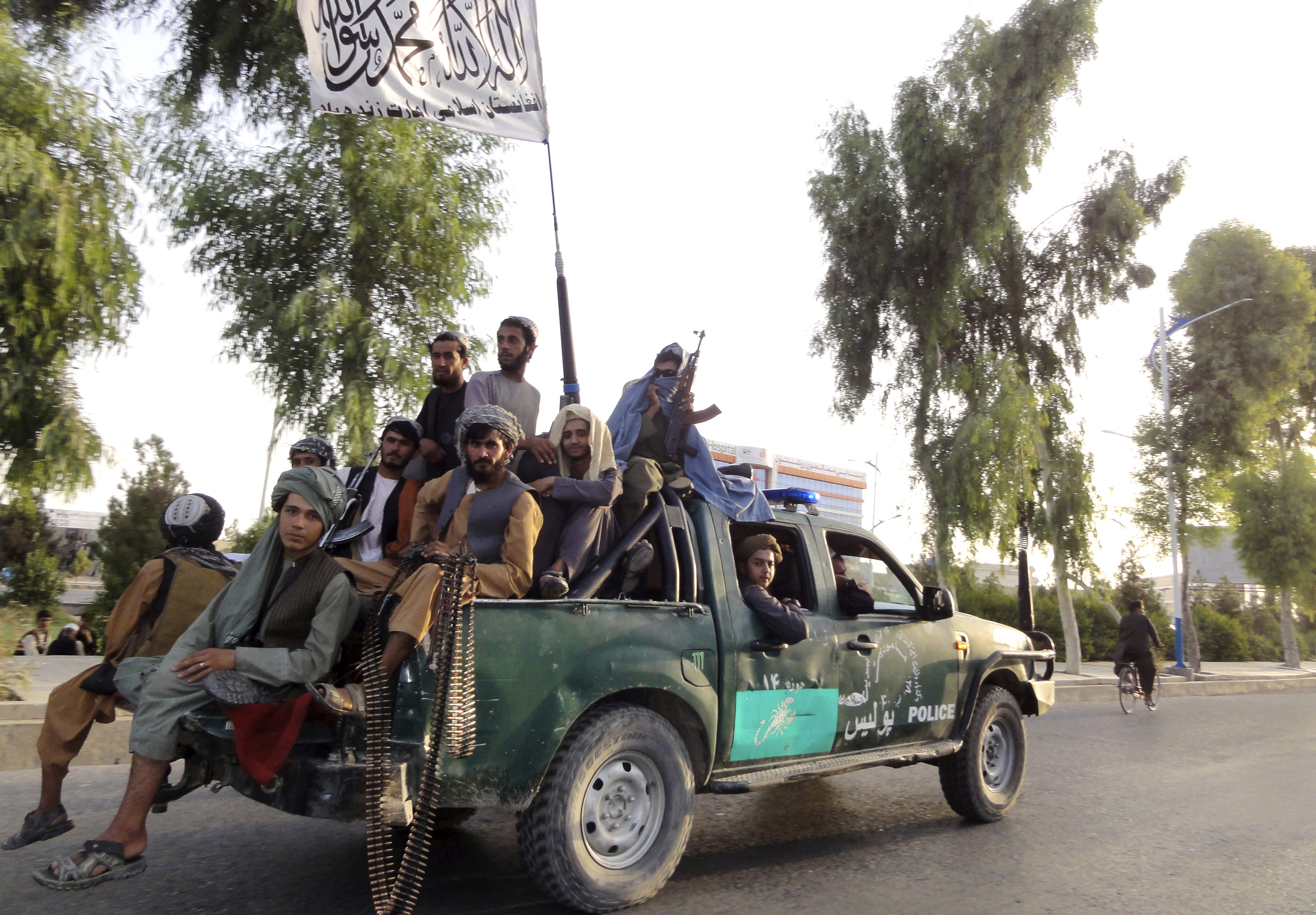 Taliban fighters patrolled inside the city of Kandahar, southwest Afghanistan, on Aug. 15, 2021.