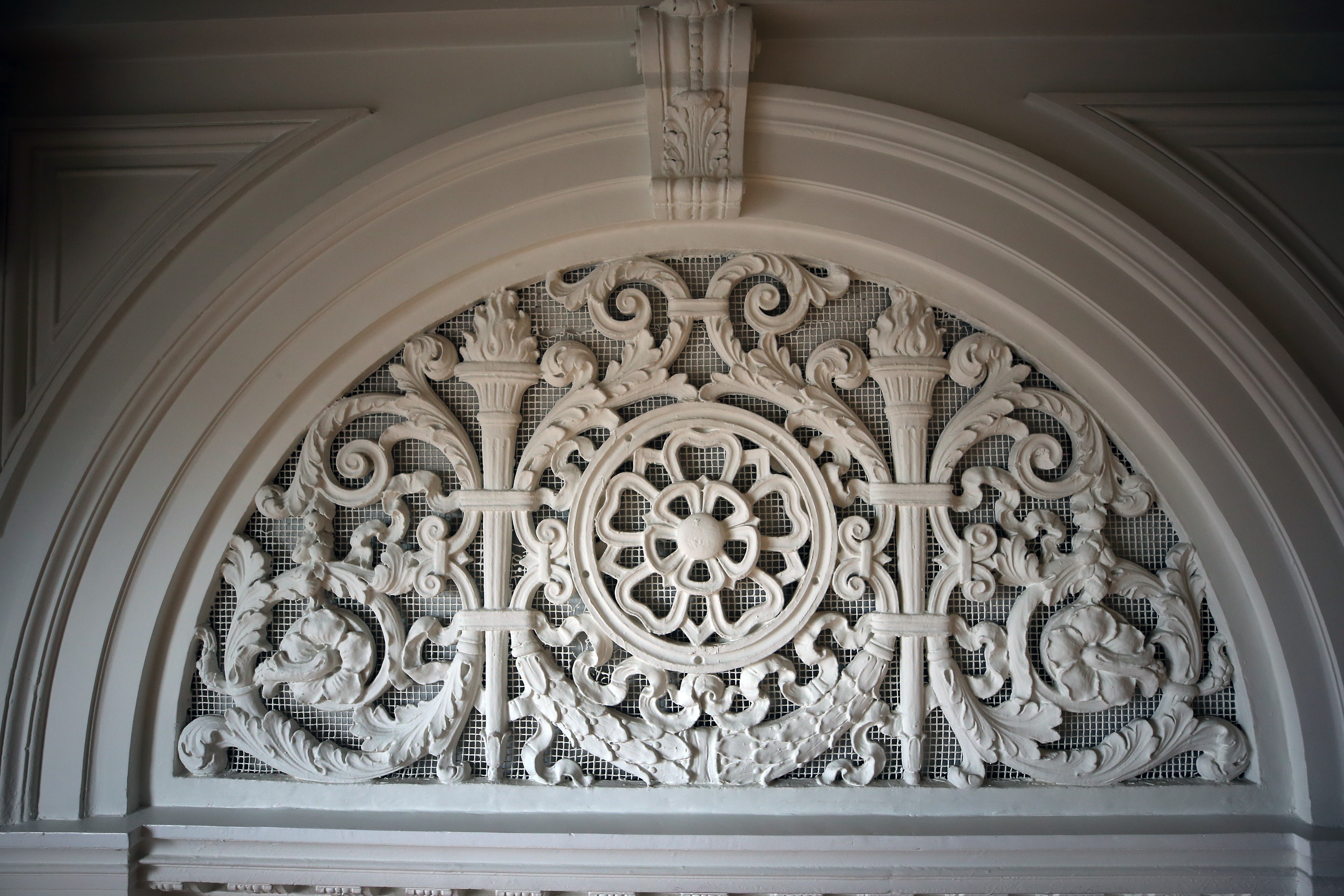 BOSTON, MA - 1/06/2021: 011721HOMEOFTHEWEEK....A view of wall decoration that was used as a vent. Home of the Week is of an apartment for rent on the fourth floor of the old Charlestown High School in Boston. A small unit that has decorative walls and high ceilings because it used to be part of the auditorium. (David L Ryan/Globe Staff ) SECTION: BUSINESS