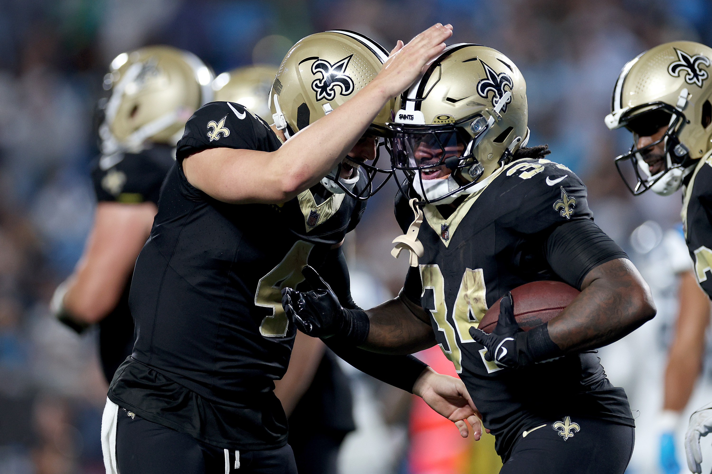 Tony Jones Jr. scores twice, Saints' defense shuts down Panthers