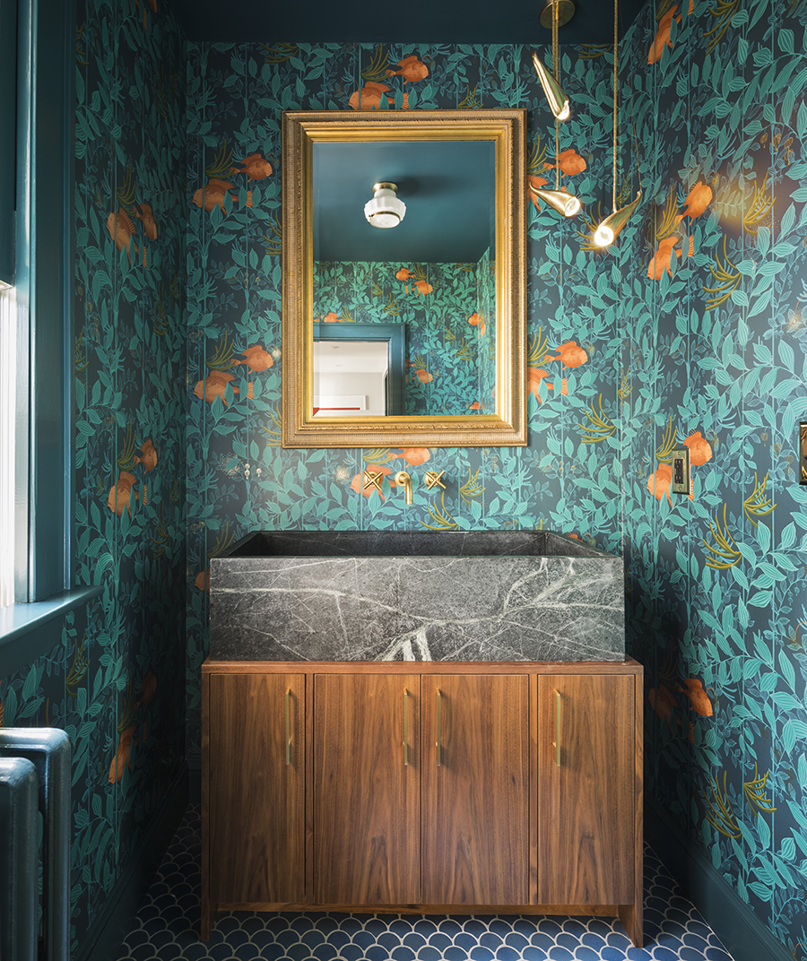 Existing floor tile informed the choice of the Cole & Son Nautilus wallpaper in the powder room.