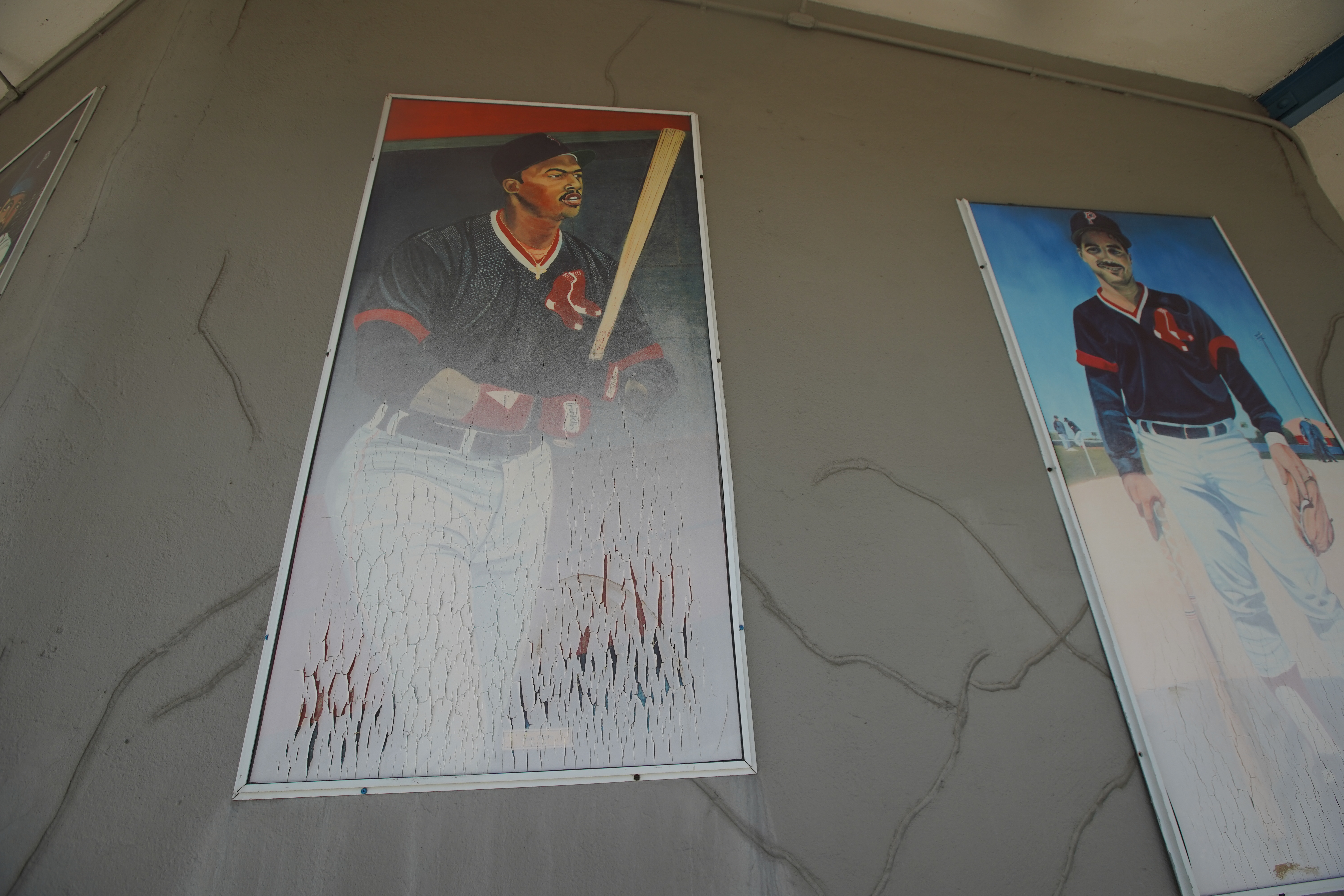 Weathered and faded, the likeness of Sam Horn and Jody Reed are a few of the players that line the walls at McCoy.