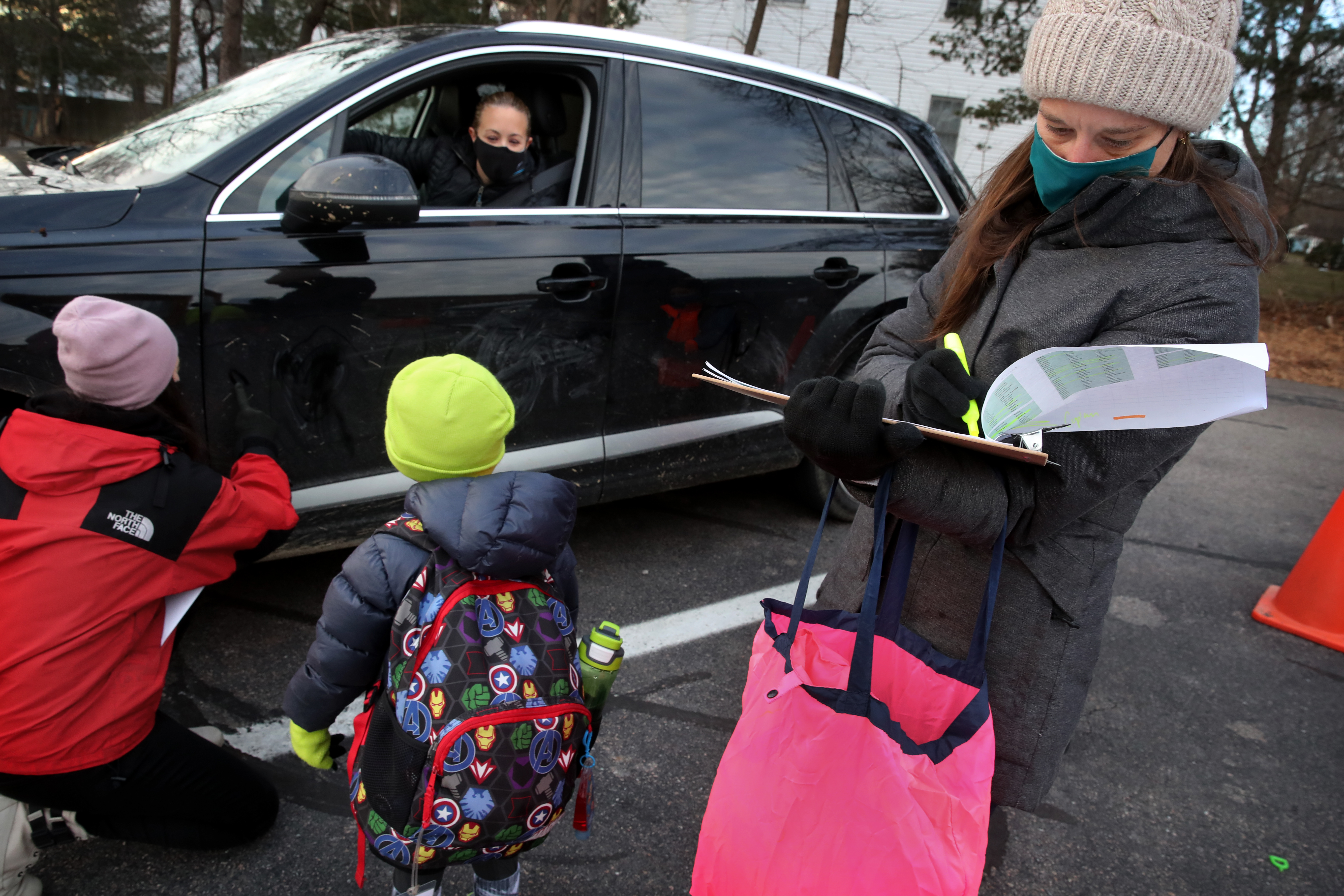 Callie Davis recorded incoming specimens as children arrived at Temple Beth Shalom in Needham.