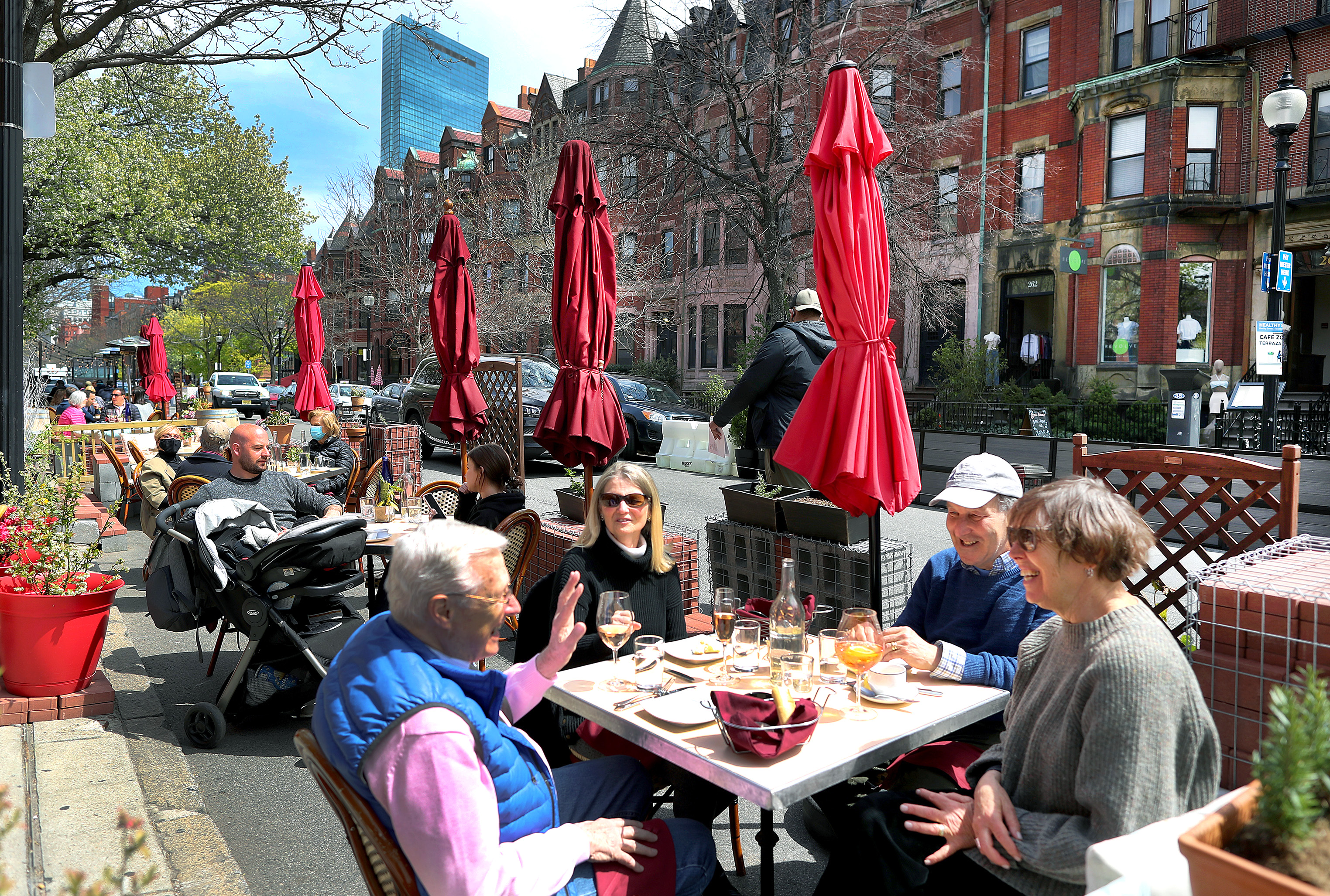 People dined outside at La Voile on Newbury Street Tuesday afternoon.