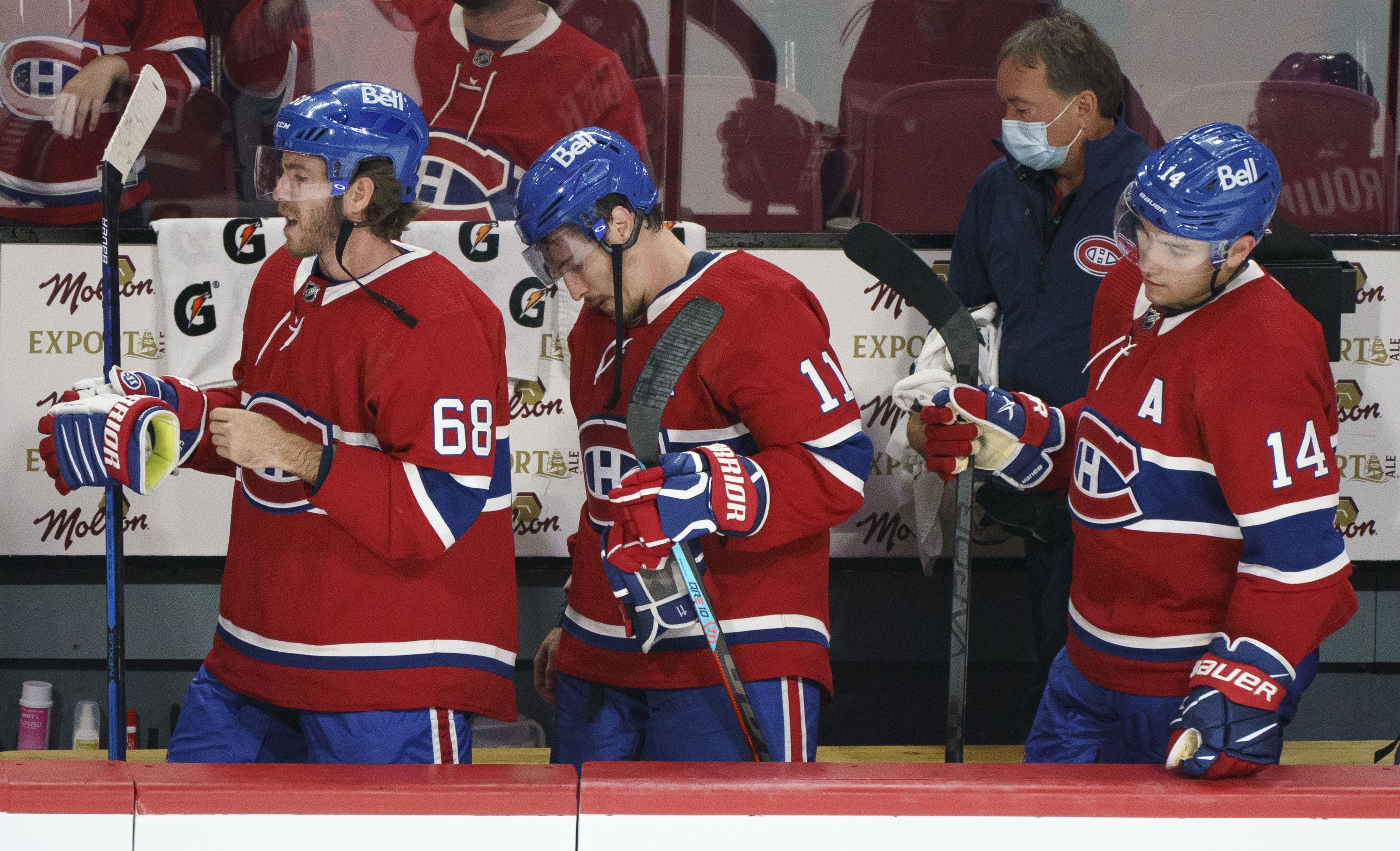 Montreal Canadiens' Mike Hoffman, Brendan Gallagher and Nick Suzuki head to the locker room following the team's loss to the Carolina Hurricanes last week.