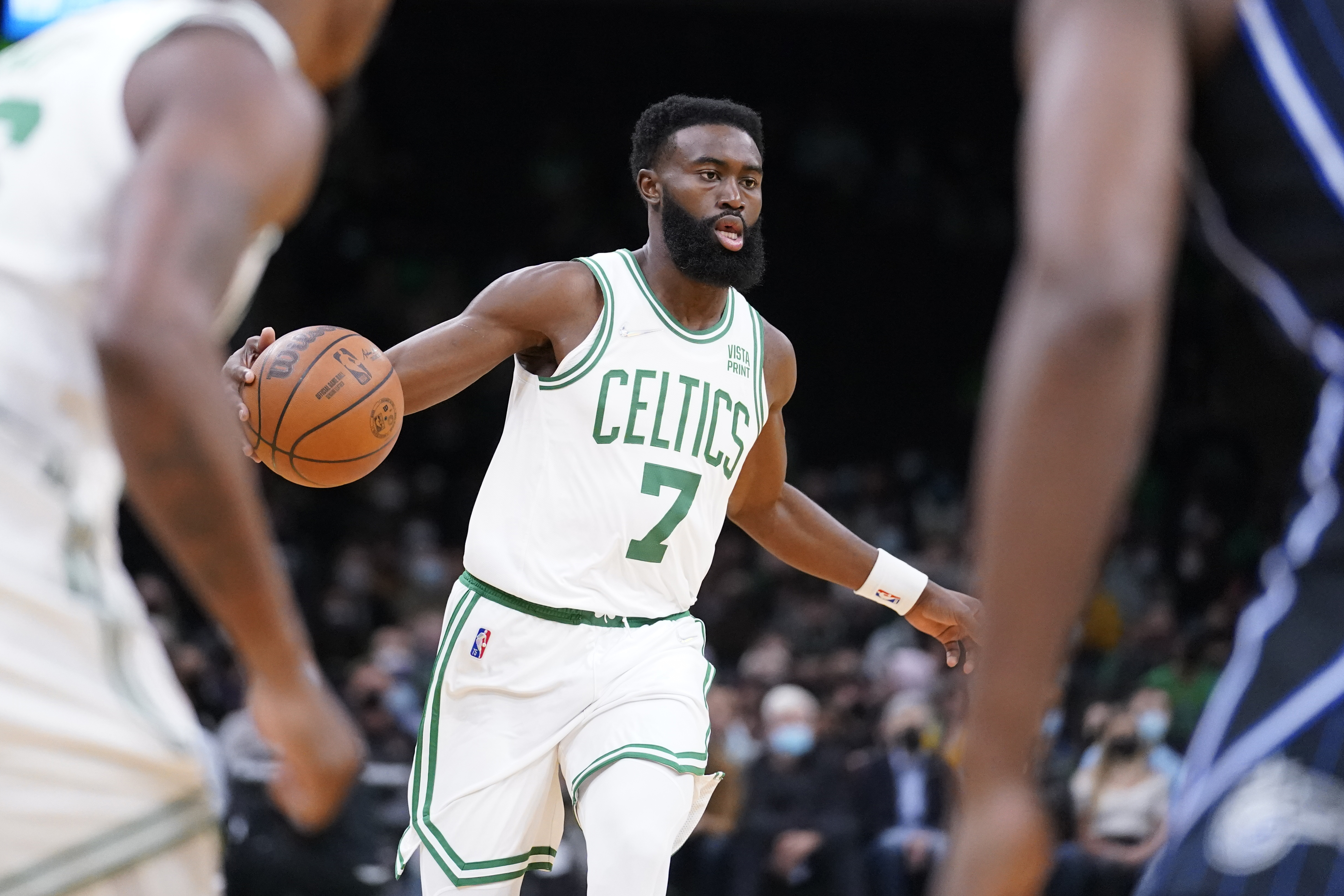 Jaylen Brown looks to pass in the second half of Monday's preseason win.