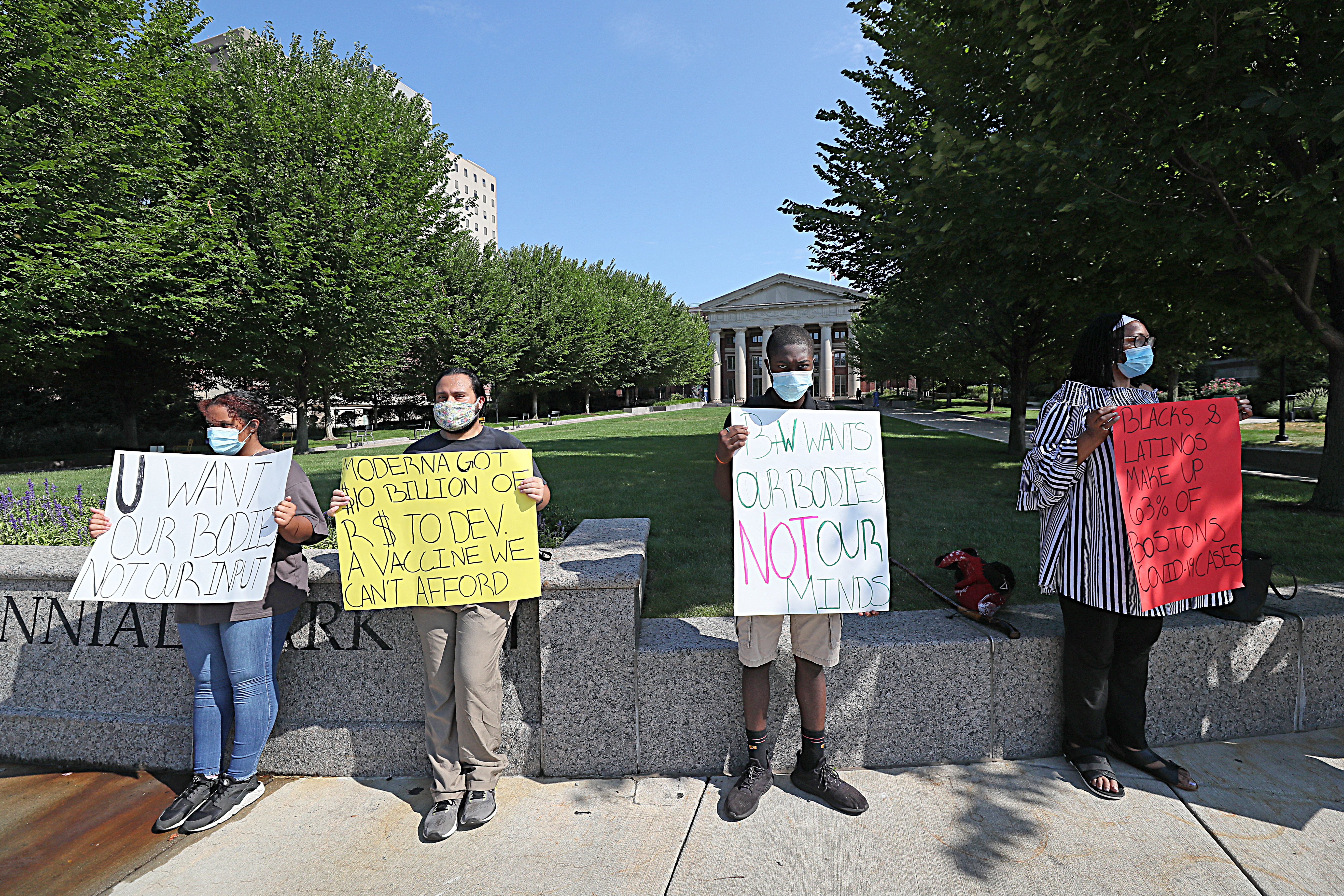 Black residents and allies converged on Brigham & Women’s Hospital to protest what they say is hypocrisy in action in the hospital’s handling of patient recruitment in COVID-19 vaccine trials.