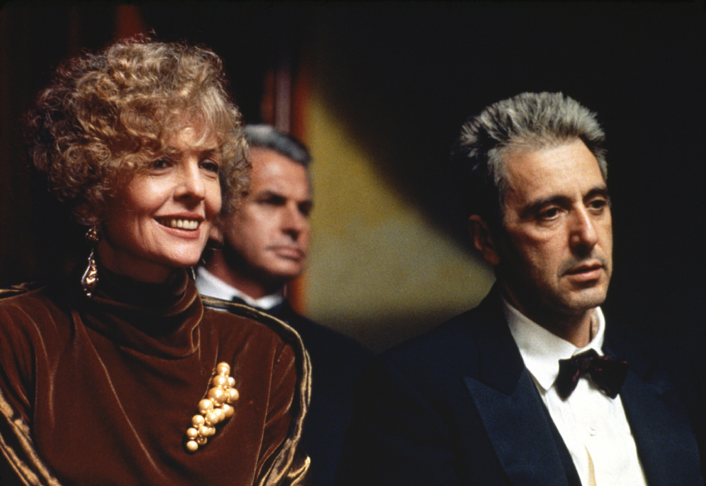 Diane Keaton, George Hamilton (background), and Al Pacino in "The Godfather Part III."