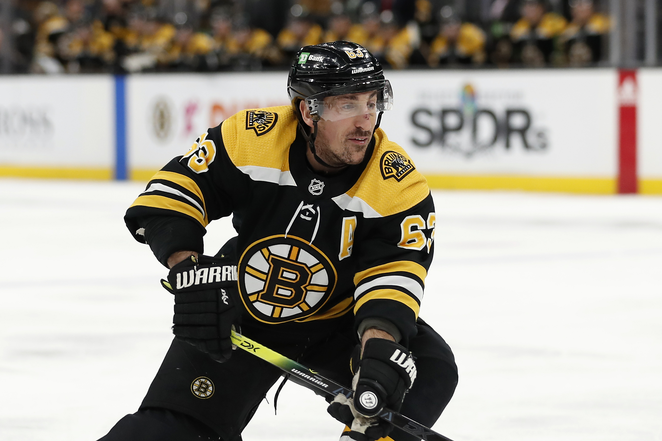 Brad Marchand and Patrice Bergeron got rather intimate at Charlie