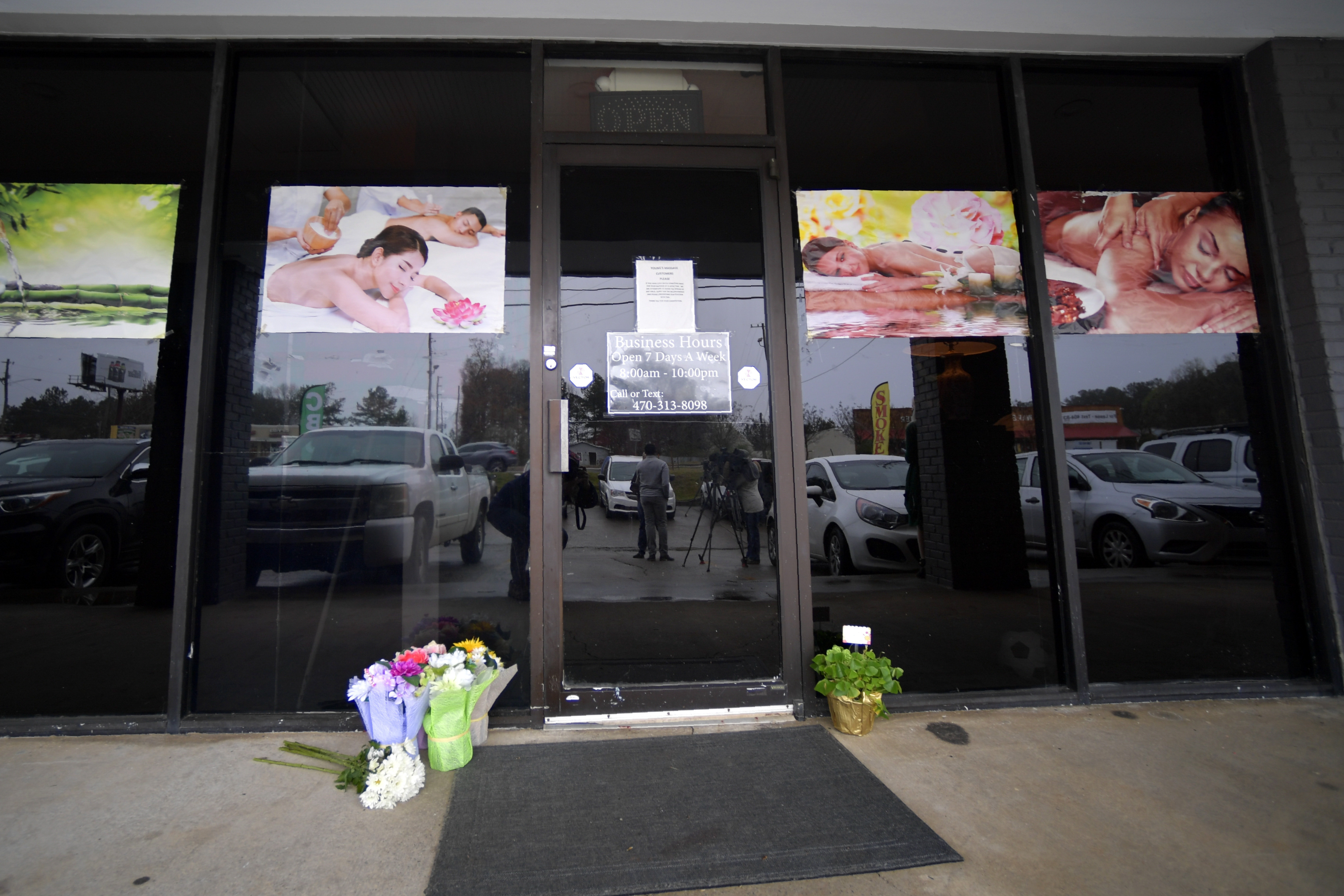 A make shift memorial is seen outside a business where a multiple fatal shooting occurred in Acworth, Ga.