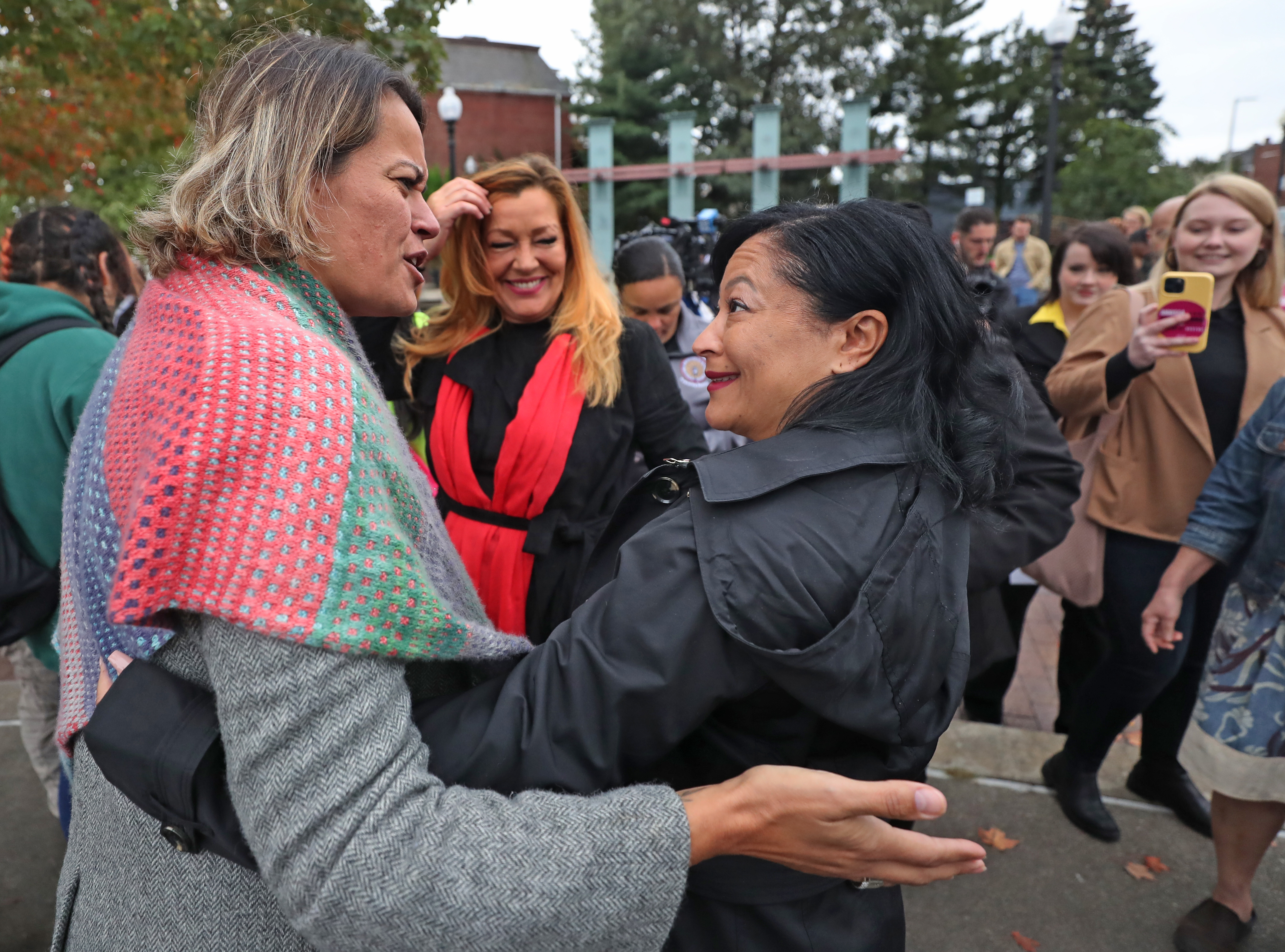 At Dudley Town Square Annissa Essabi George spoke with Tracie Rankin (center) and Felicia Tervel (right.) George was joined by residents, community leaders and advocates to release her official Equity, Inclusion and At Justice Agenda on Tuesday.