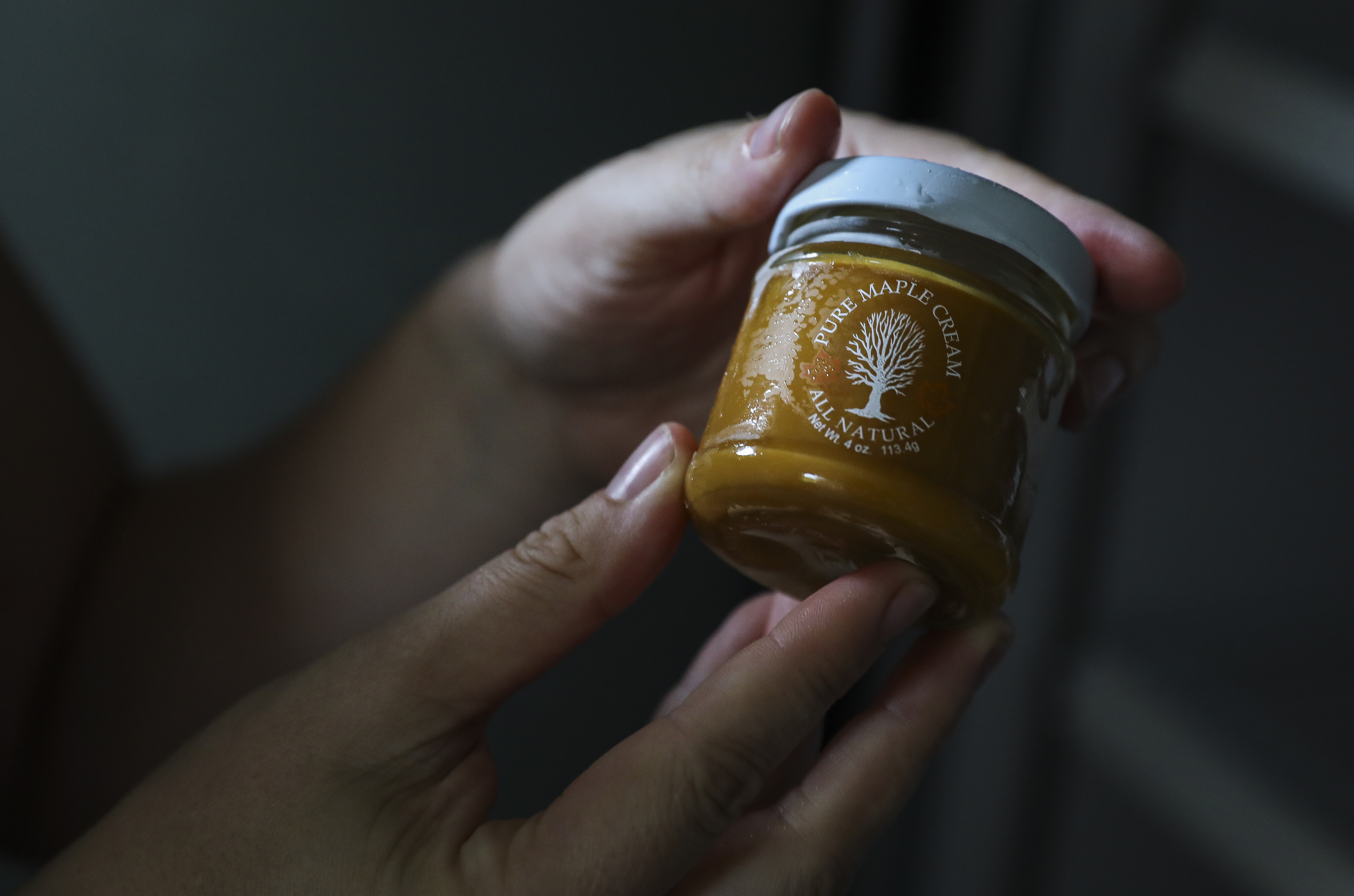 Sarah Lipinski, owner of Sweet Brook Farm, holds a jar of maple cream, which can be found in her new store located on the family’s farm in Williamstown.