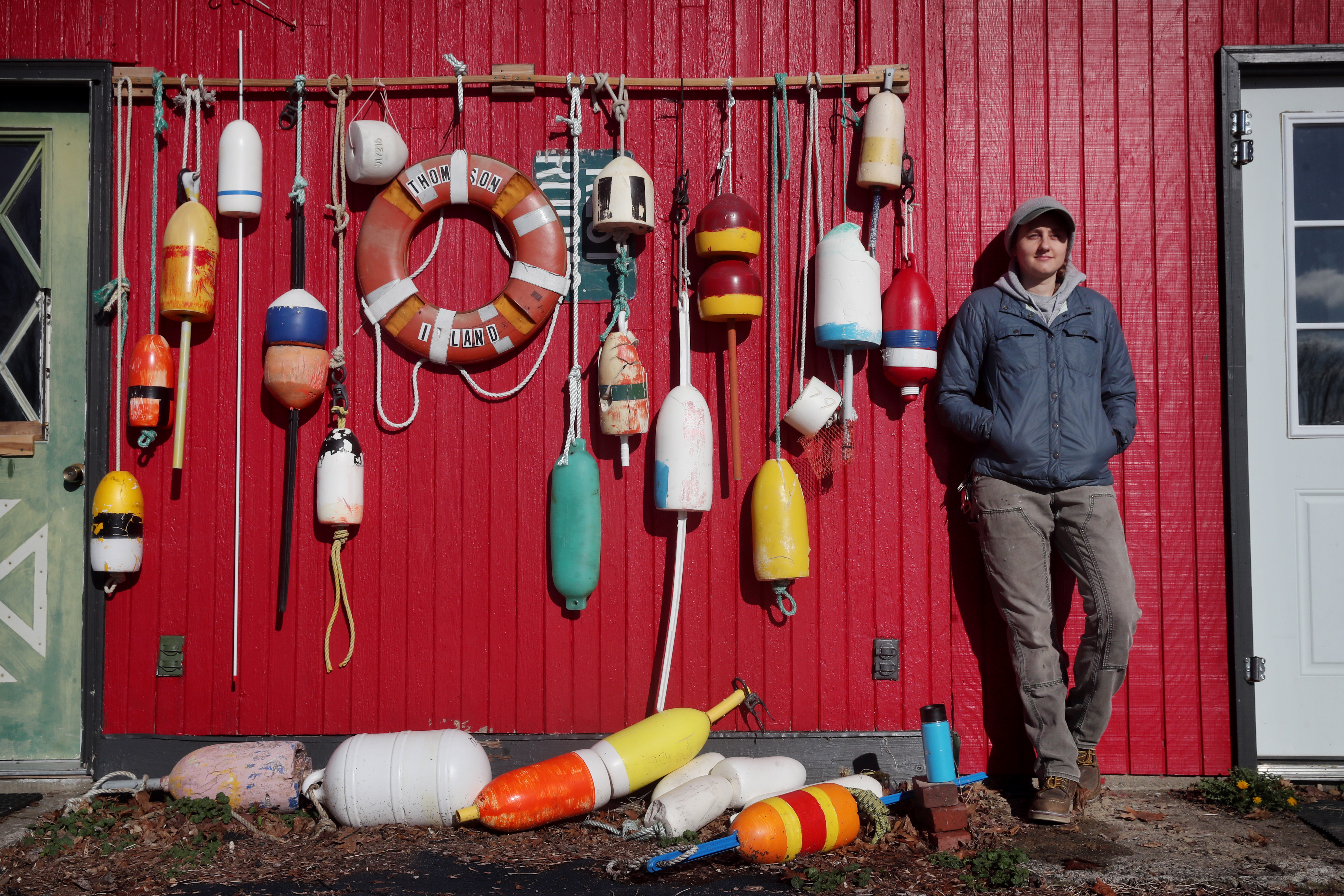 Laurel Wills, logistics and operations manager of the Thompson Island Outward Bound Educational Center, outside her living quarters.