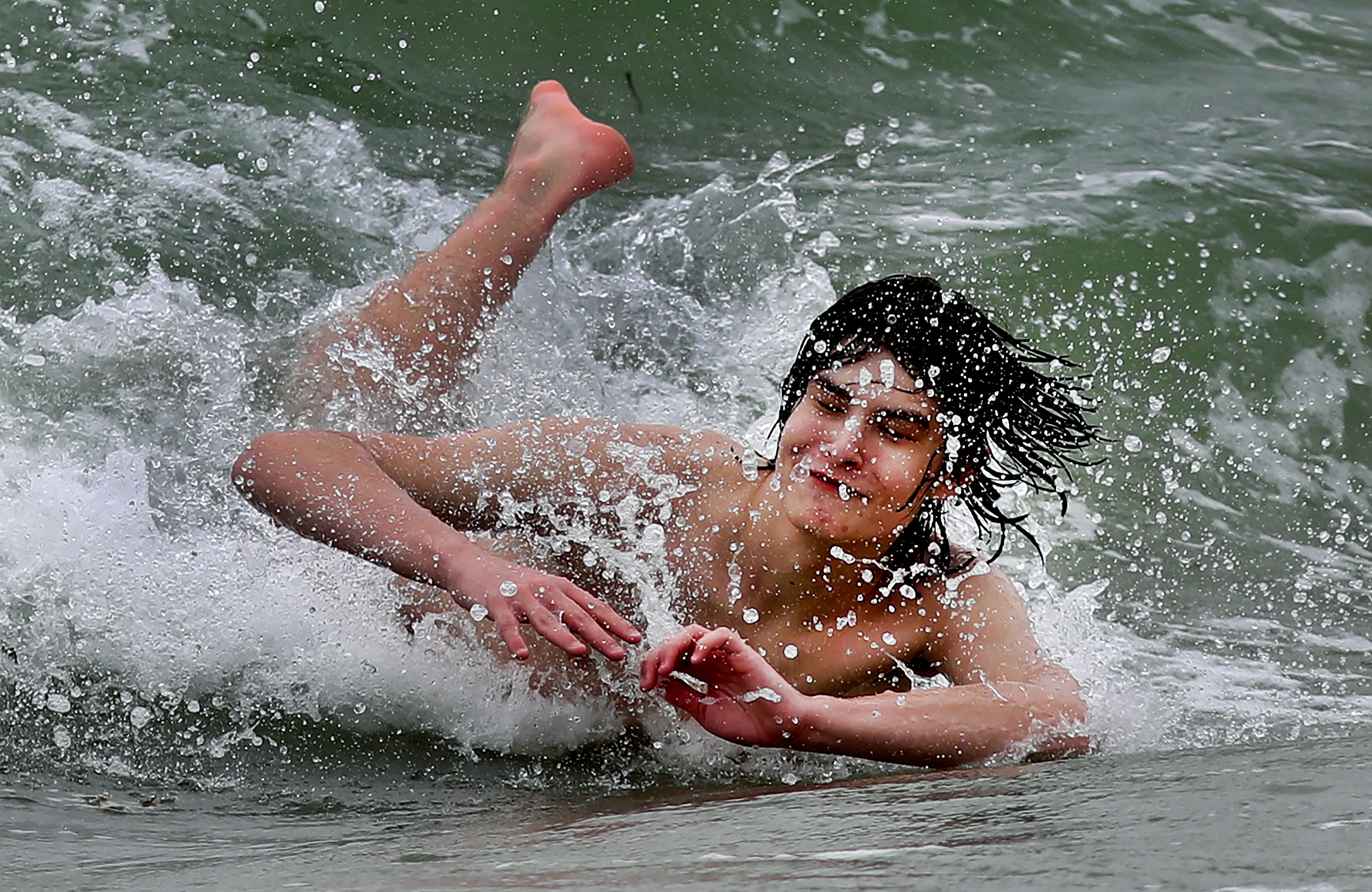 Matthew Lokey, 16, from Newtown, Conn., enjoyed the surf at Coast Guard Beach in Eastham.