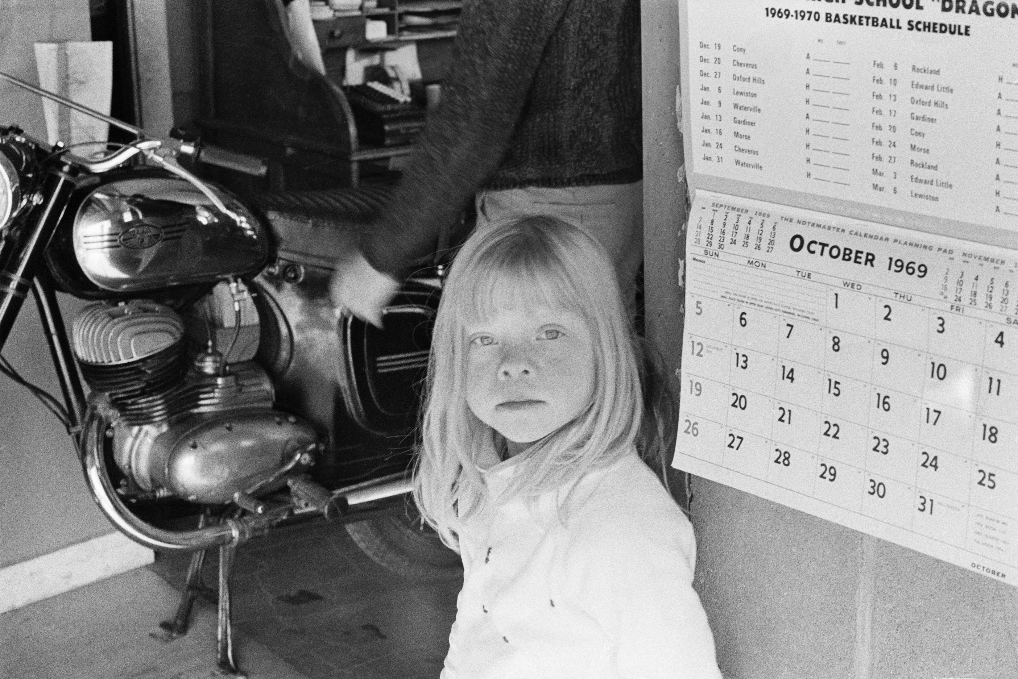 Abelardo Morell's "Motorcycle, Girl and Calendar," from 1969.