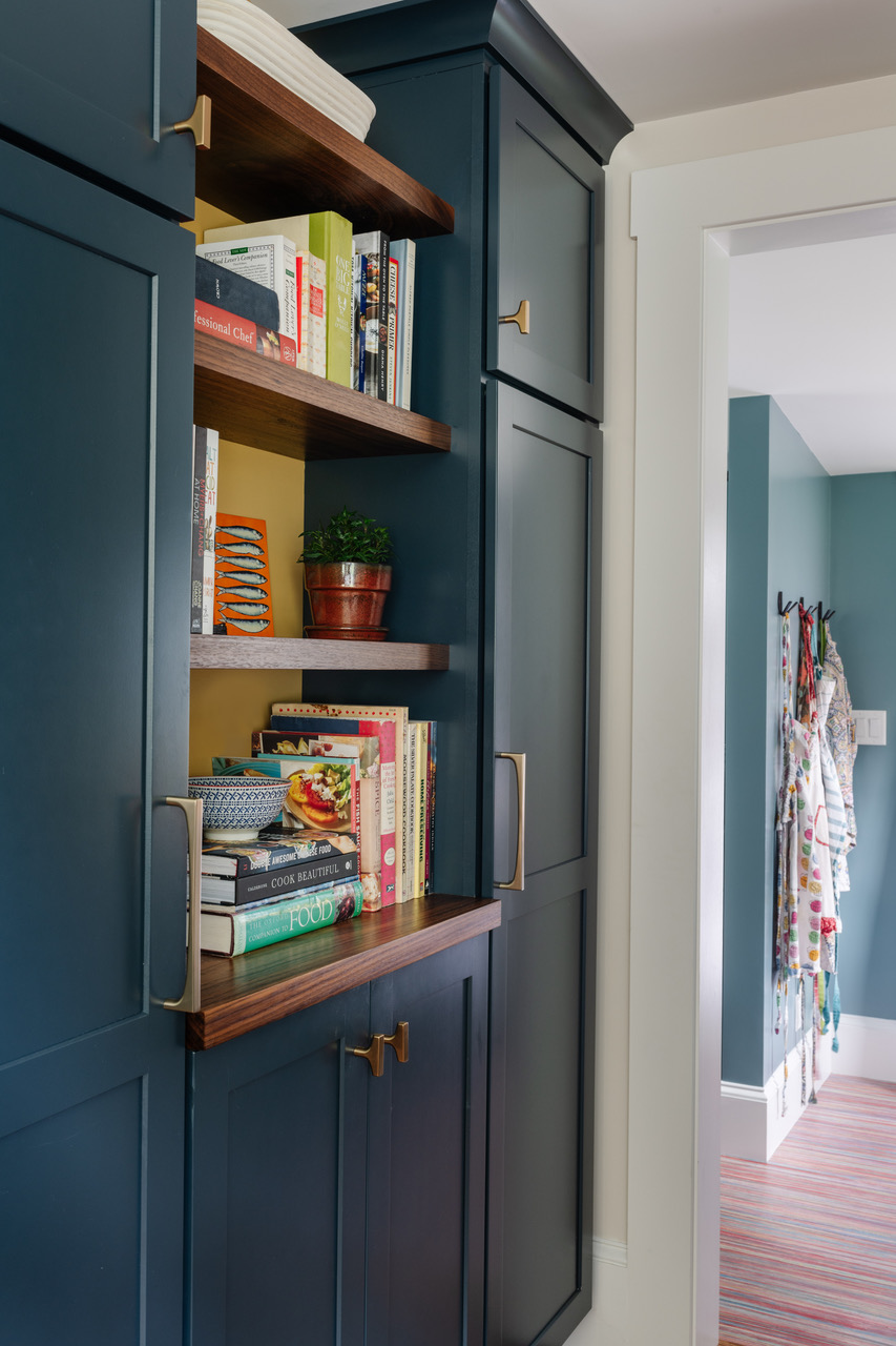 The bookshelf back is Benjamin Moore Yellowstone.