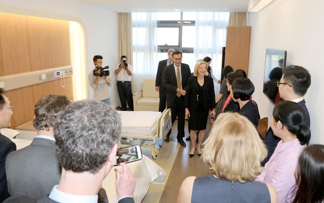 Brigham Health's Nabel (center) toured the Boao Evergrande International Hospital in China with a group from Boston as part of a celebration of the hospital's 2018 opening.
