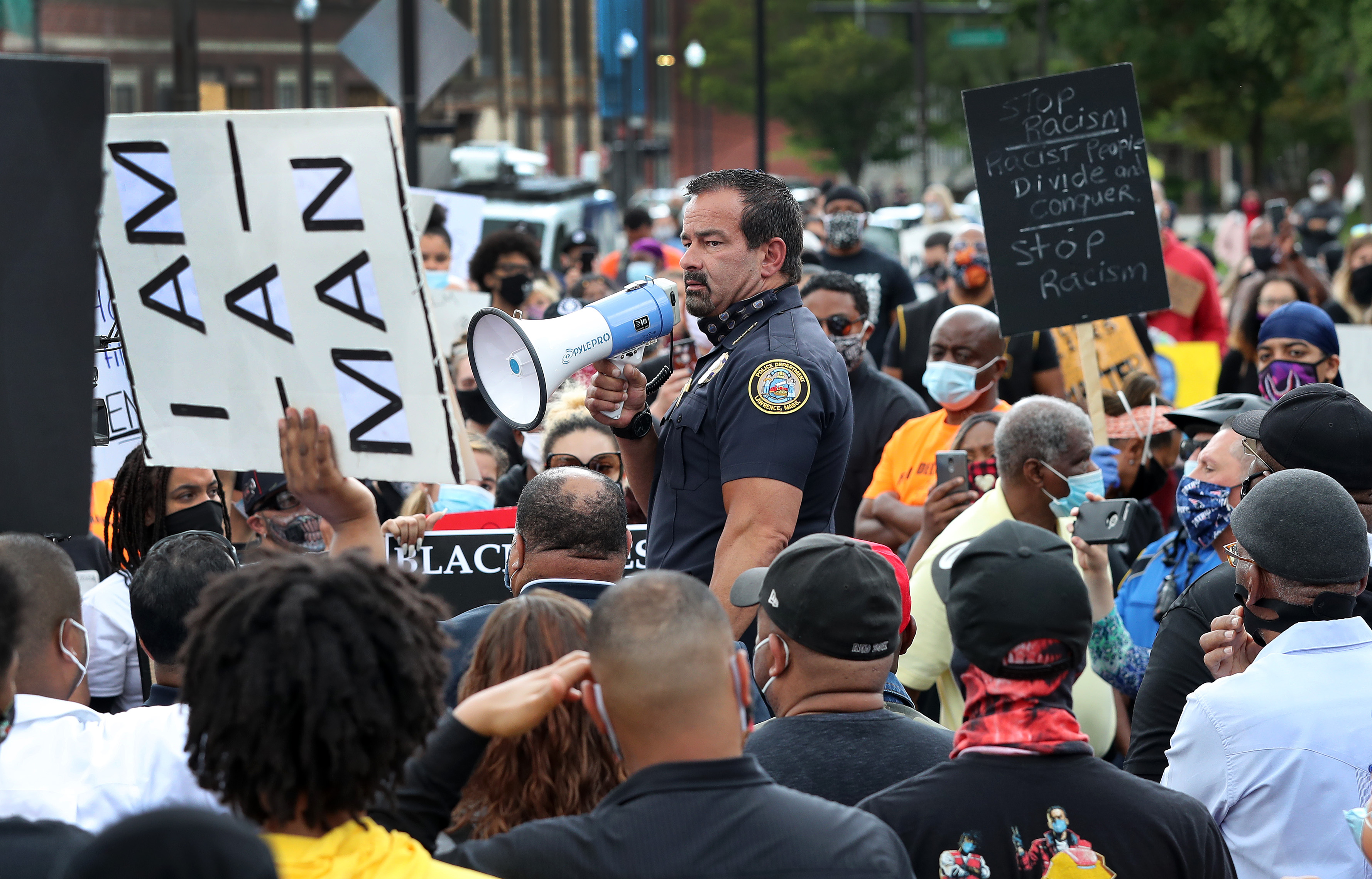 Near the end of the event, Lawrence Police Chief Roy Vasque took the megaphone and spoke to the crowd.