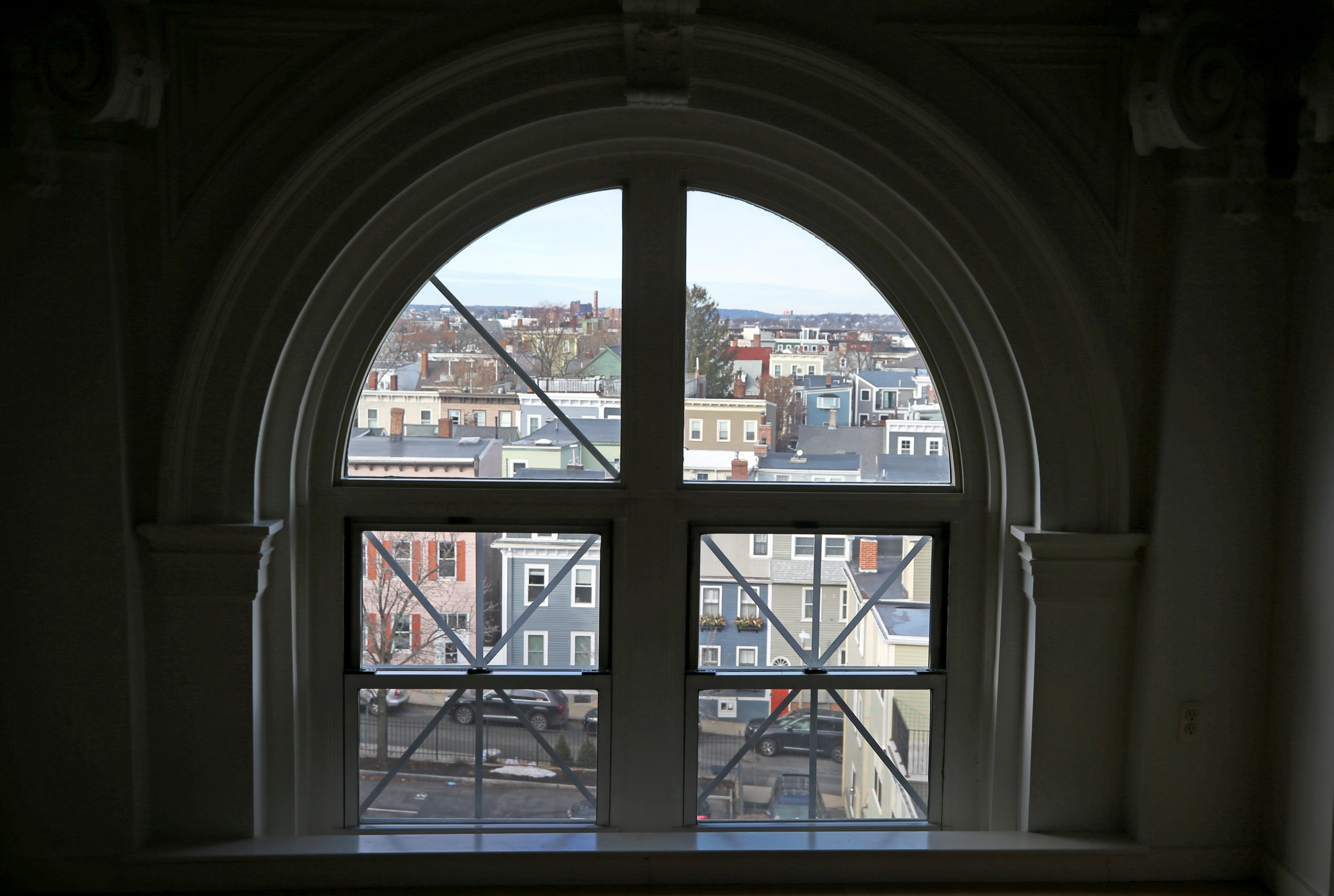 BOSTON, MA - 1/06/2021: 011721HOMEOFTHEWEEK....View from window in living room. Home of the Week is of an apartment for rent on the fourth floor of the old Charlestown High School in Boston. A small unit that has decorative walls and high ceilings because it used to be part of the auditorium. (David L Ryan/Globe Staff ) SECTION: BUSINESS
