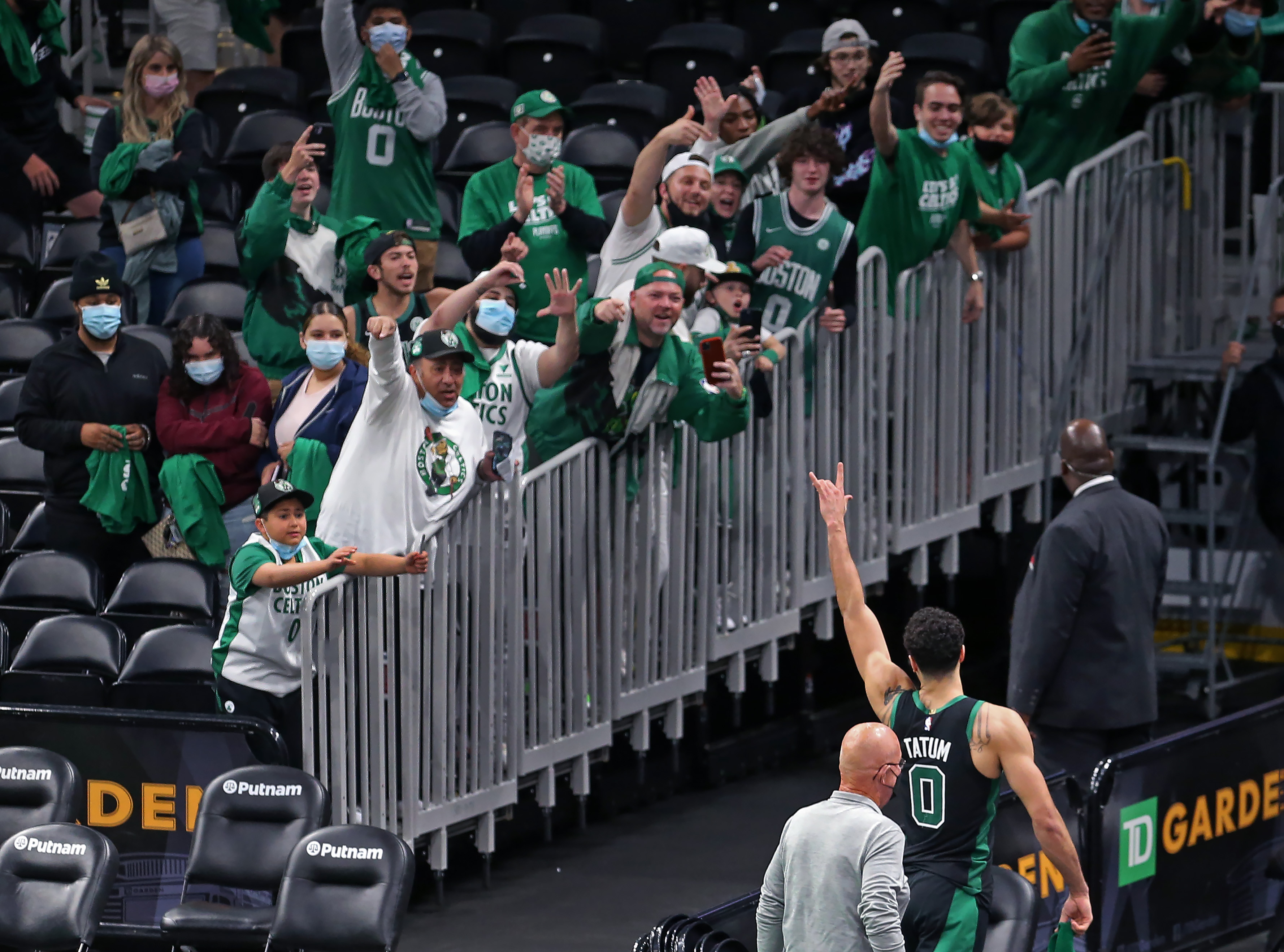 Jayson Tatum salutes the crowd after Boston's Game 3 playoff win over the Nets.