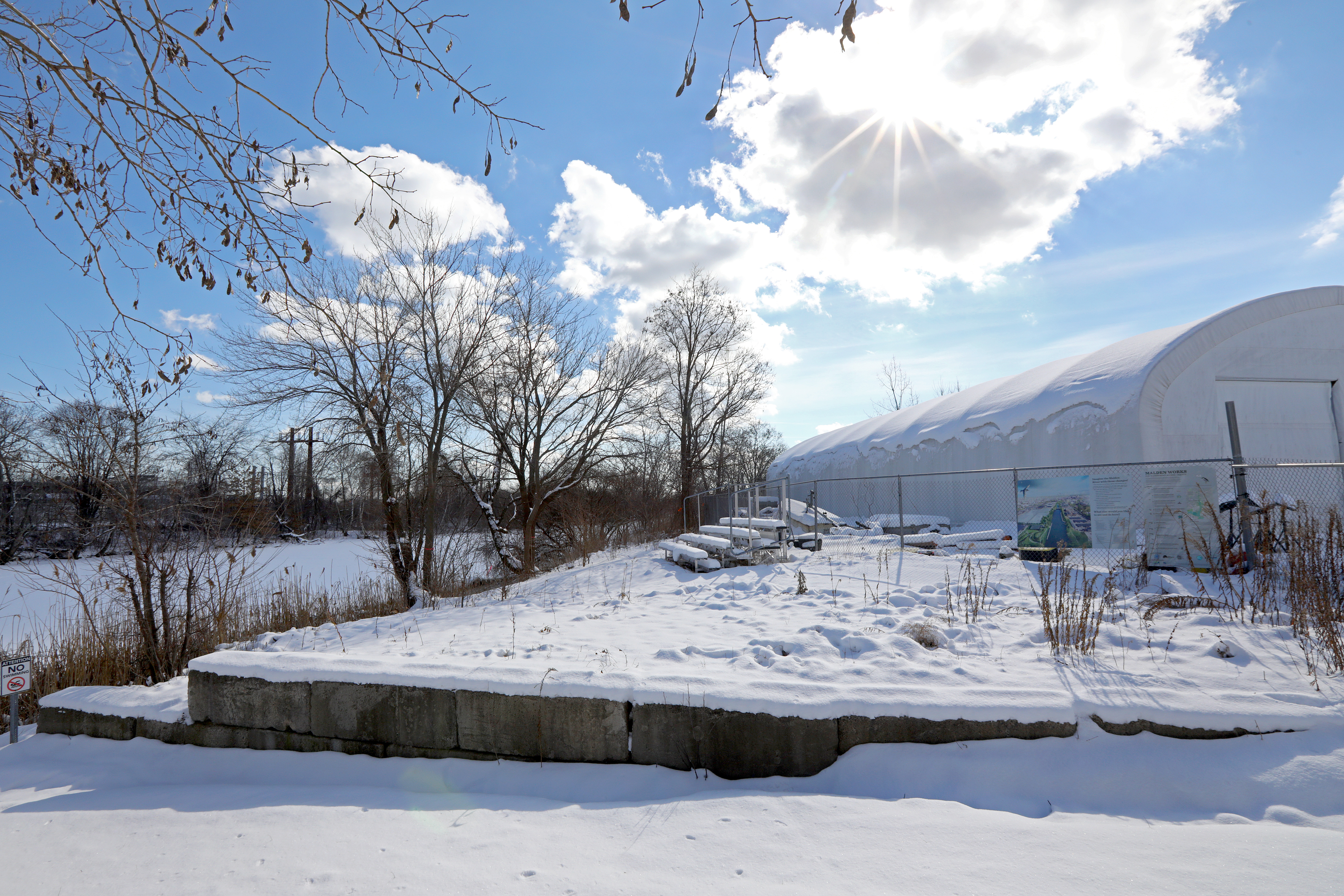 This part of the current Malden DPW yard will be included in the Malden River Works waterfront park. The rounded white structure at right is the 15-year-old "temporary" boathouse.