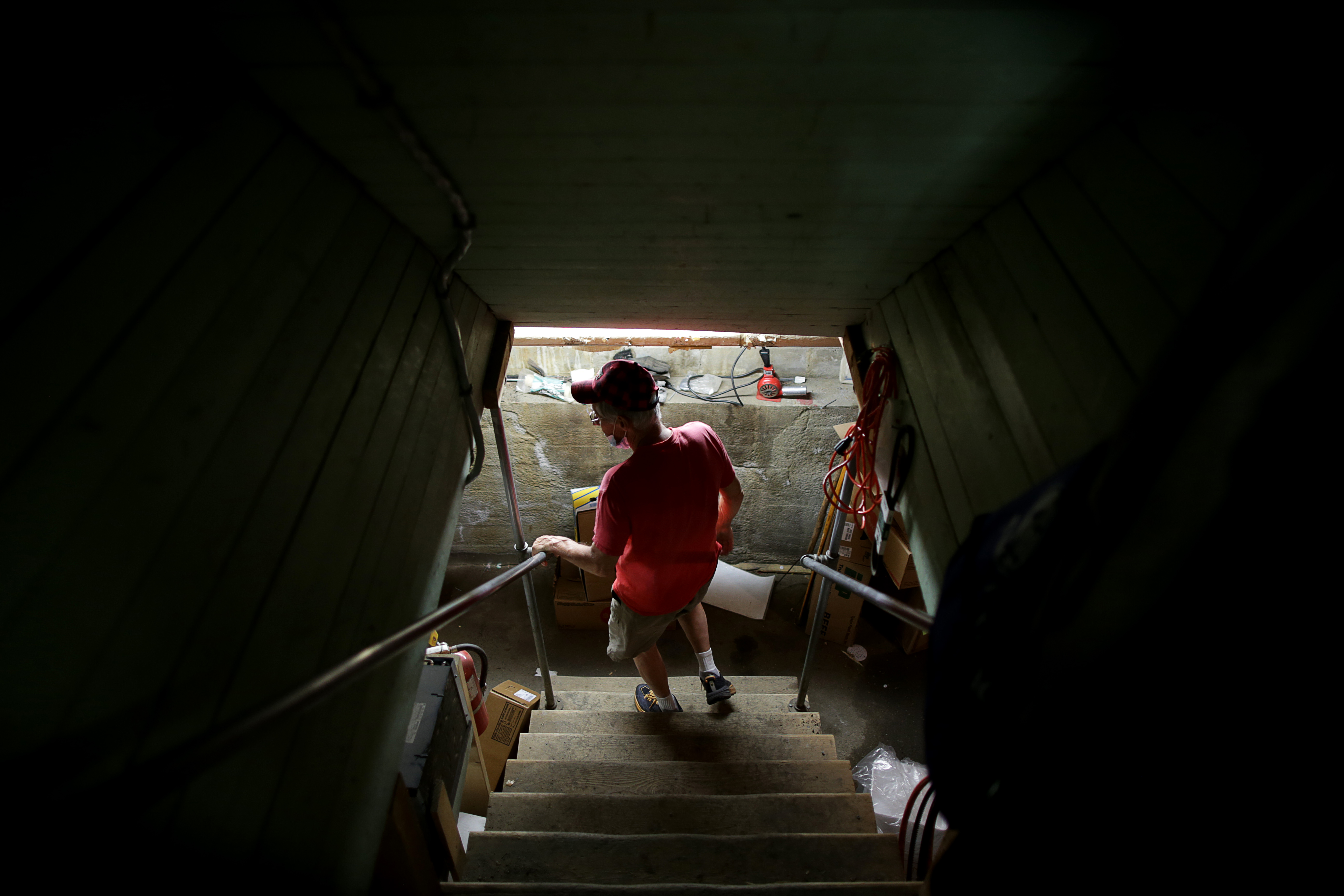 Jim Currier headed down to the basement of the store that will no longer be his family's at the end of the month.
