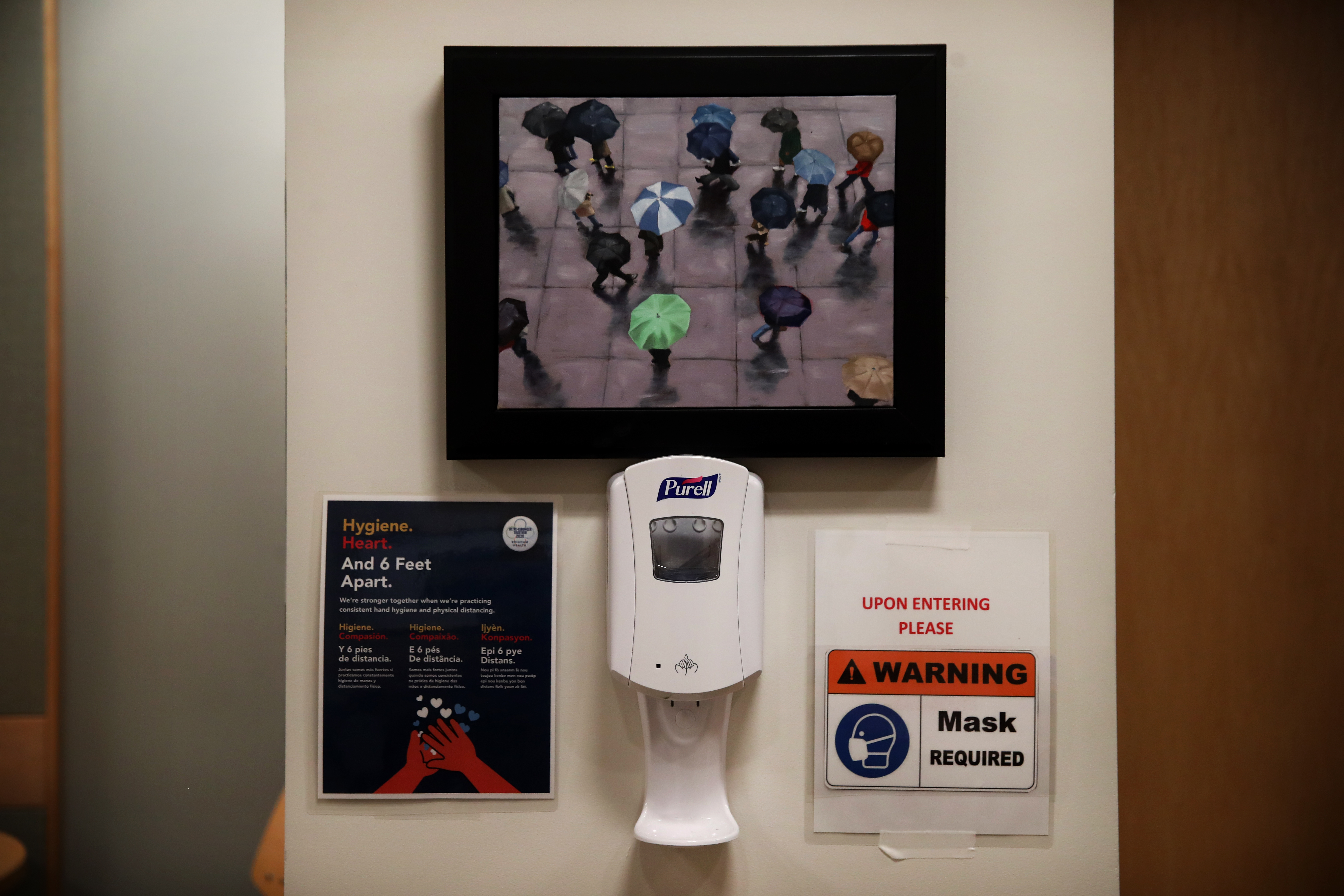 Purell and signs of precaution were hung on a wall in the radiation oncology department at Brigham and Women's Hospital in Boston.
