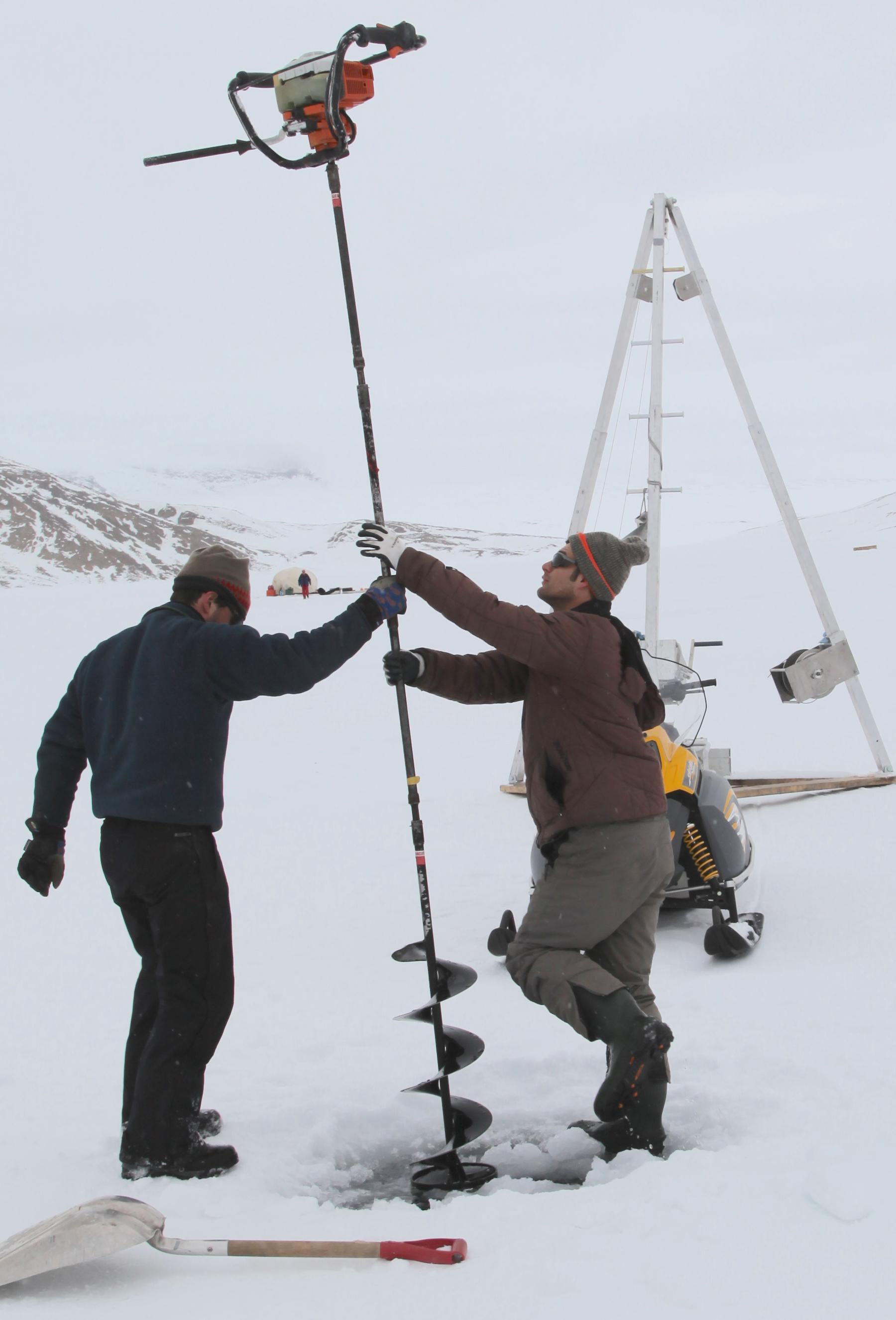 Nicholas Balascio and Francois Lapointe used an ice auger to drill into the ice at South Sawtooth Lake in Canada.