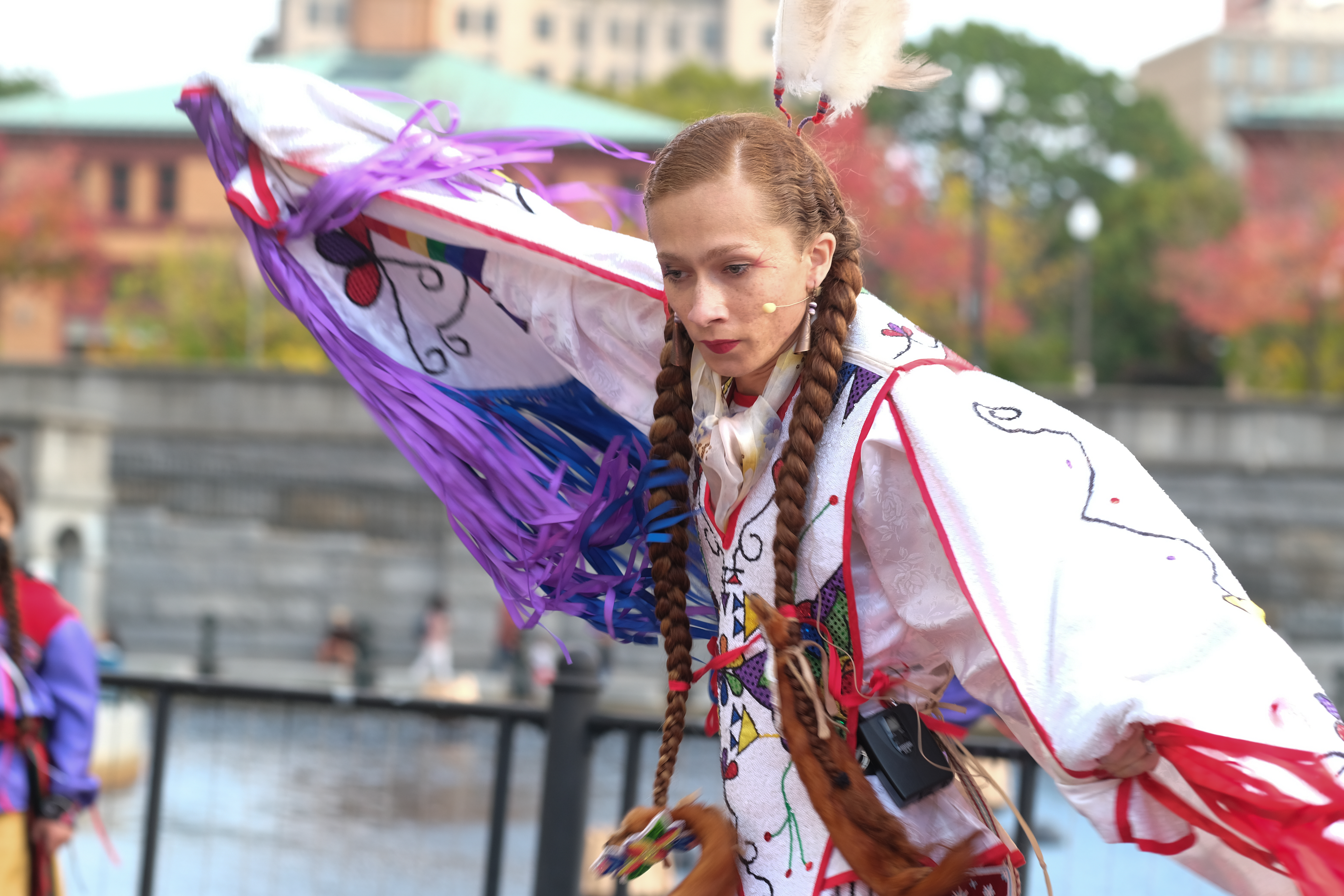 Sherenté Harris of the Harris Family Dance Troupe, which is made up of all Narragansett Indians, performs before the lighting of a WaterFire celebrating Rhode Island's BIPOC community in Providence, R.I. on Saturday, Oct. 16 2021.