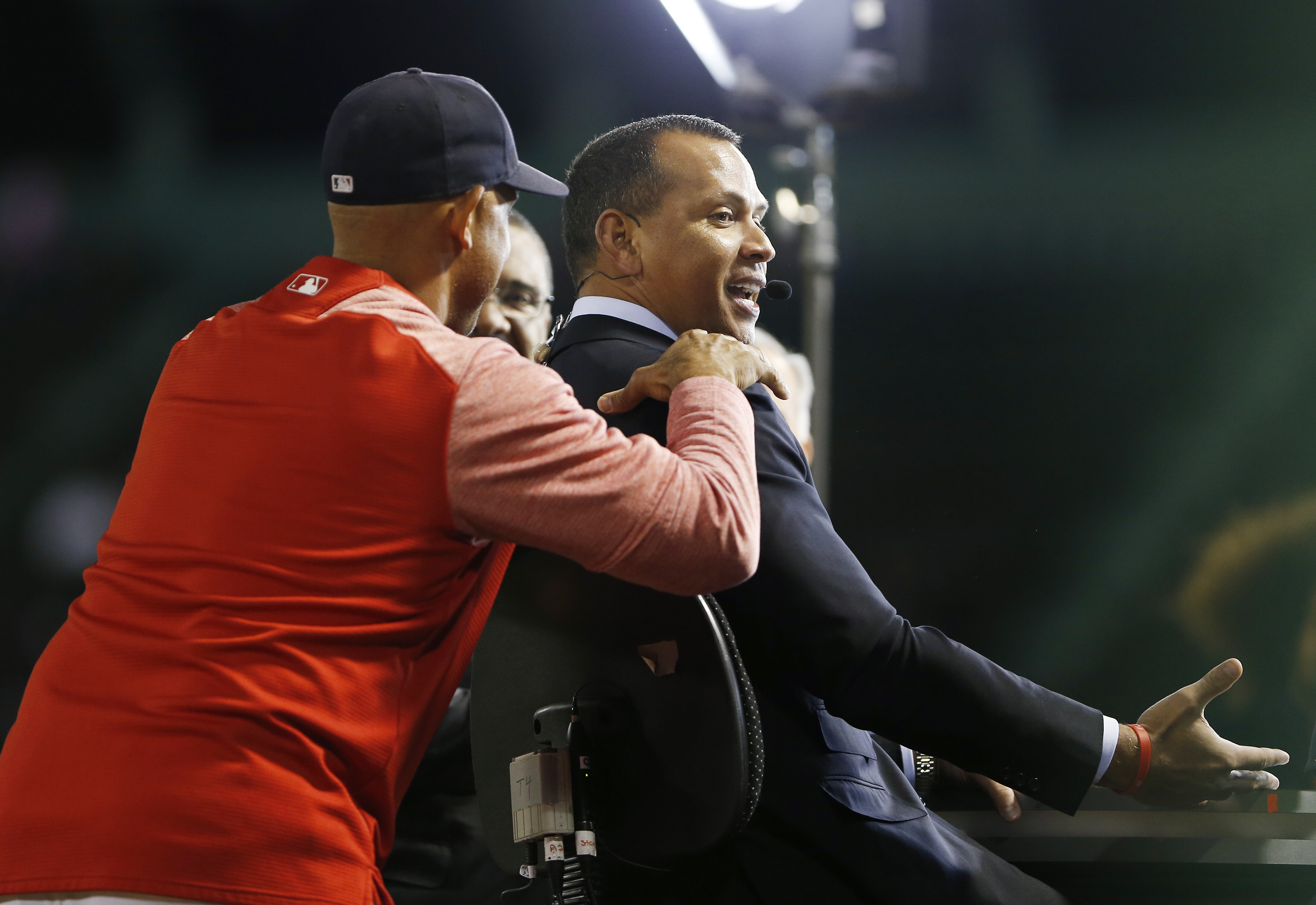 Alex Cora dropped in on ESPN commentator Alex Rodriguez before a game at Fenway Park in 2018.